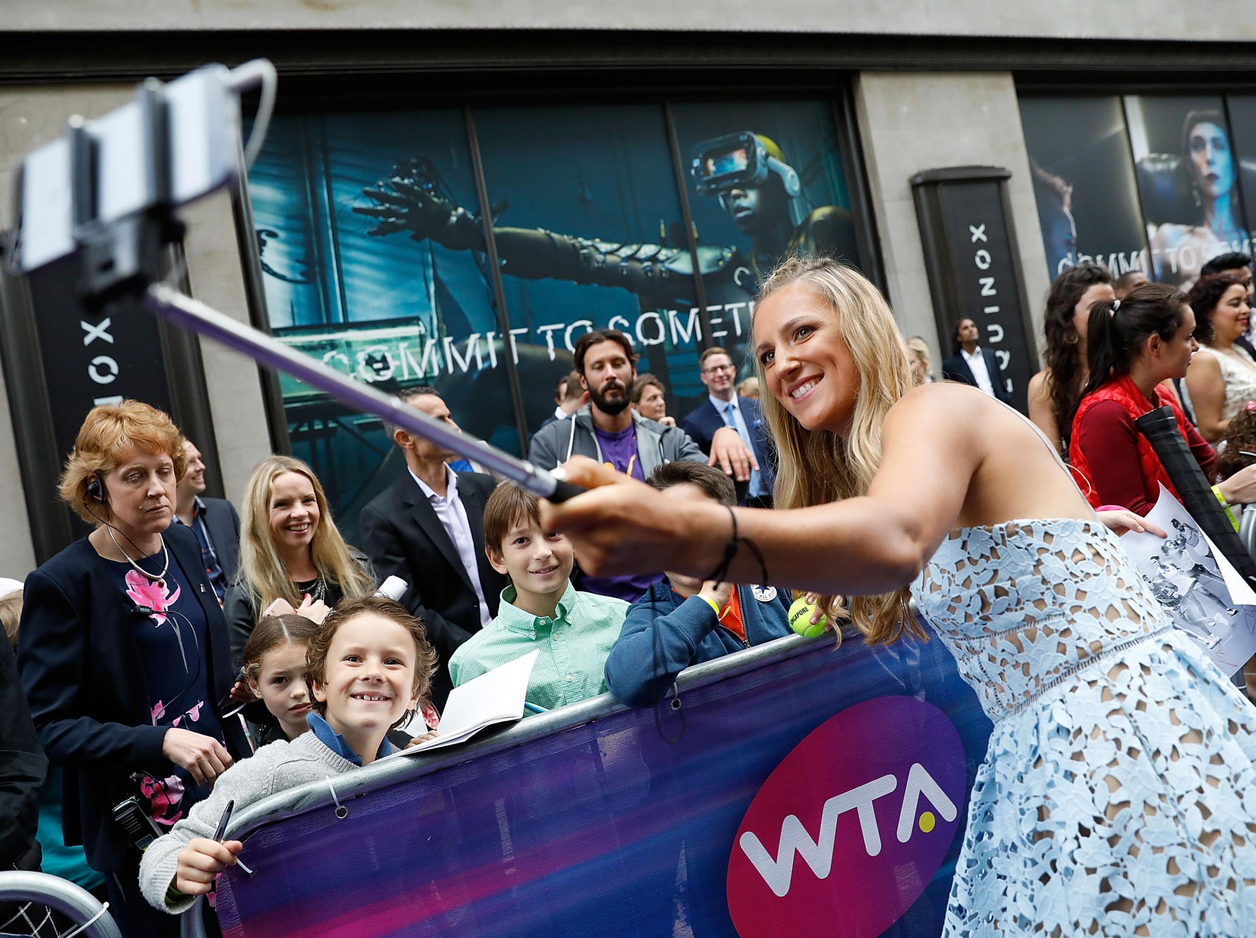 
Azarenka with fans at the WTA's pre-Wimbledon party 