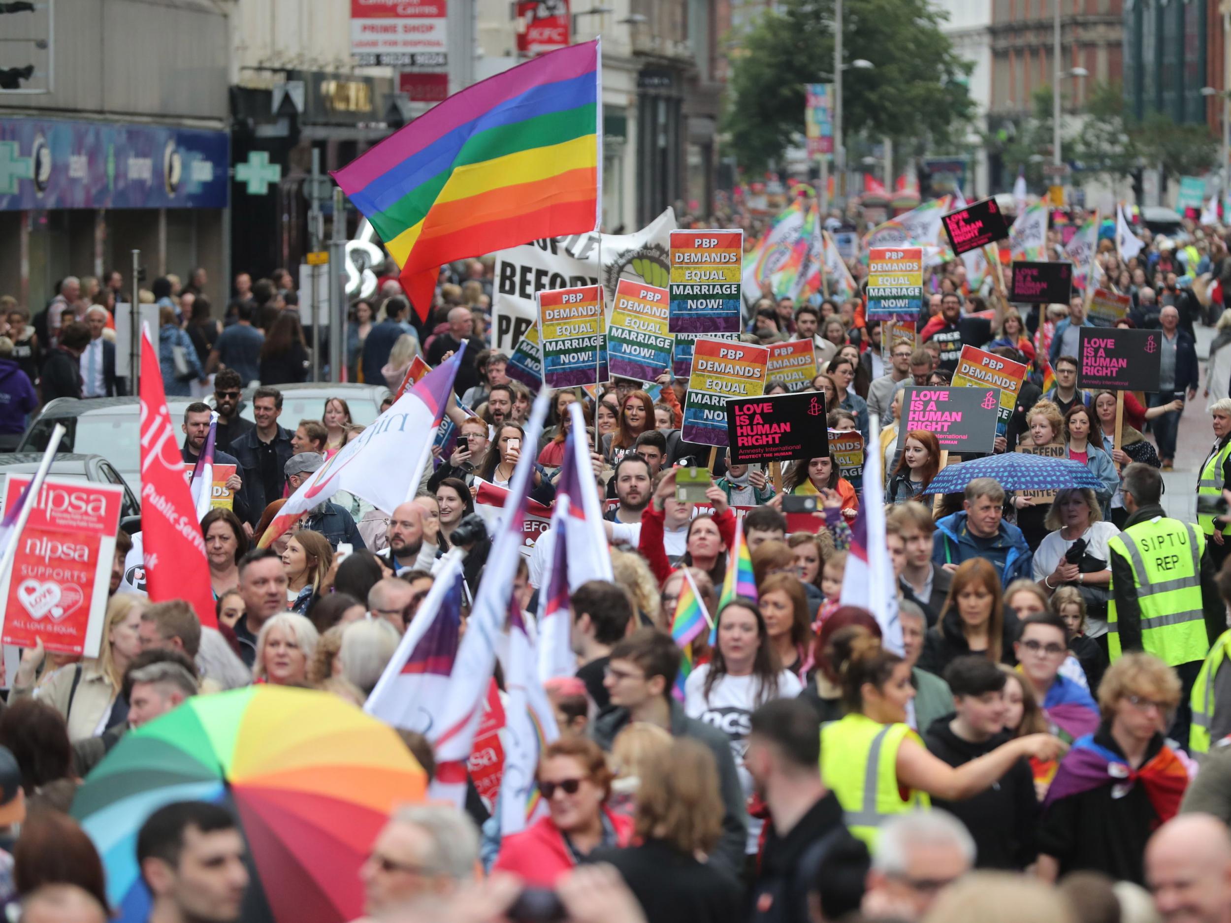 Campaigners call for the introduction of same-sex marriage in Northern Ireland at a parade and rally in Belfast City centre