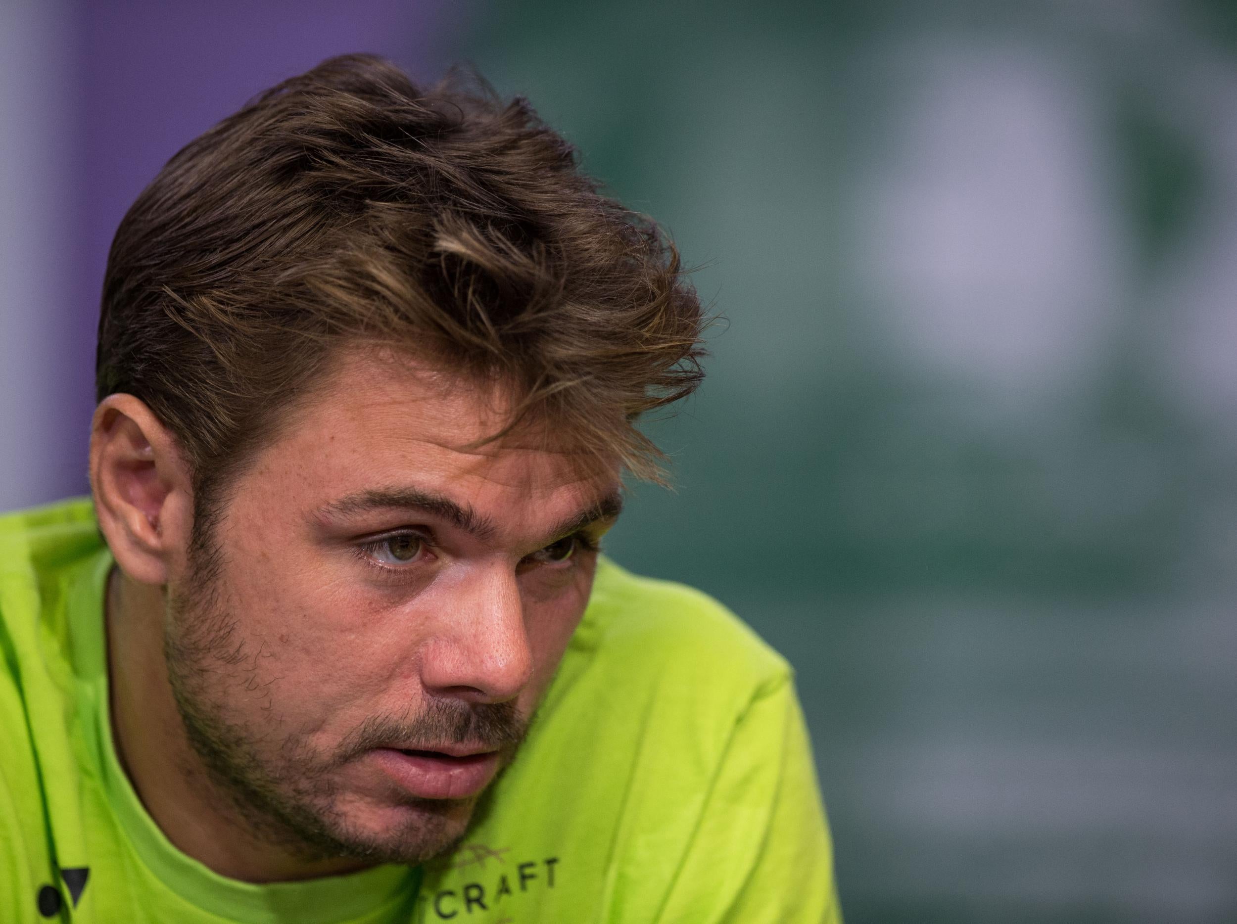 Wawrinka is a little tired of answering questions about Federer