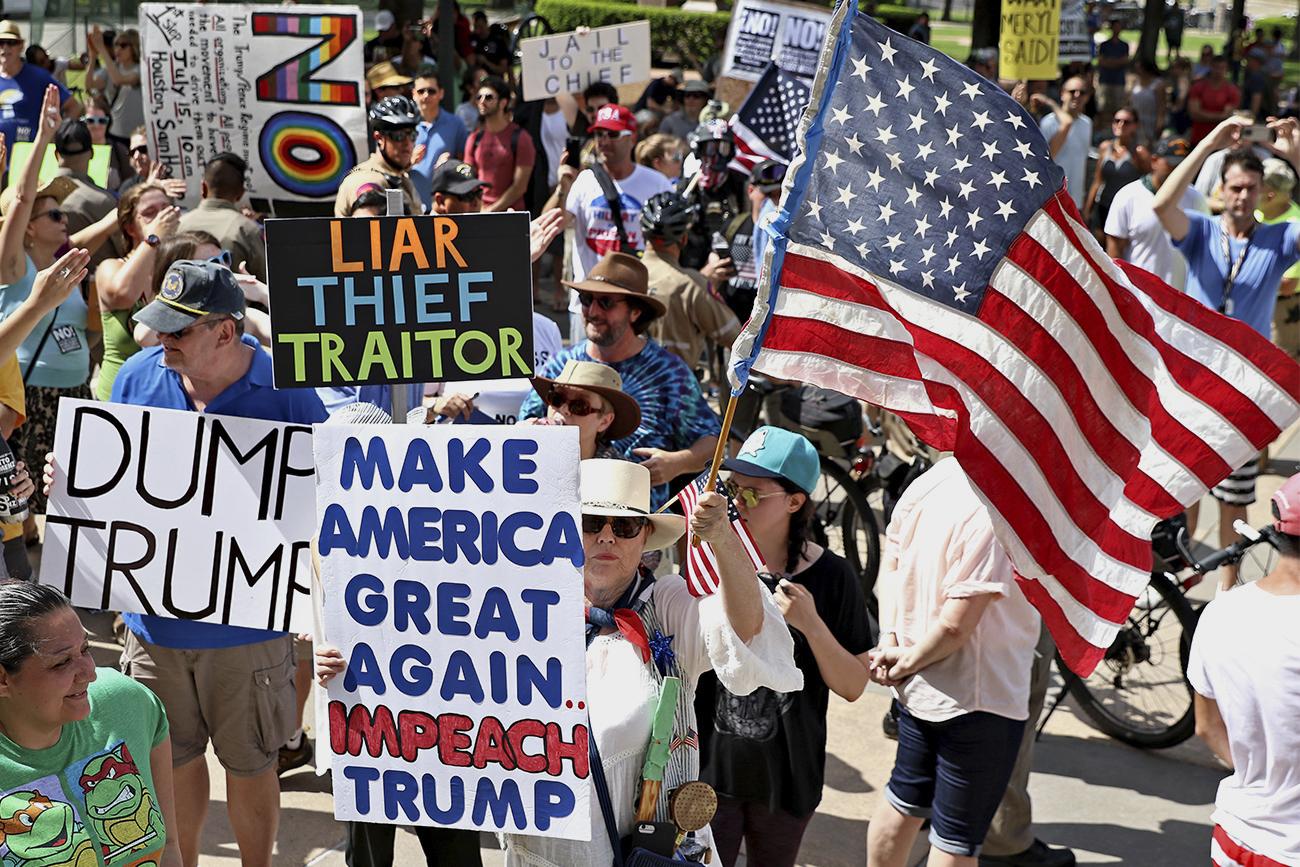 Anti-Trump supporters rally in Austin, Texas