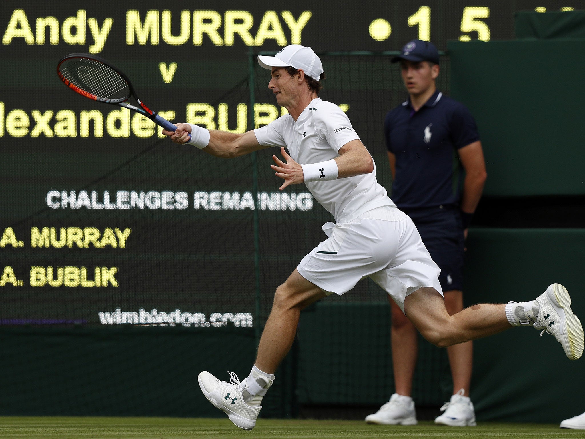 Murray reaches to make a forehand shot