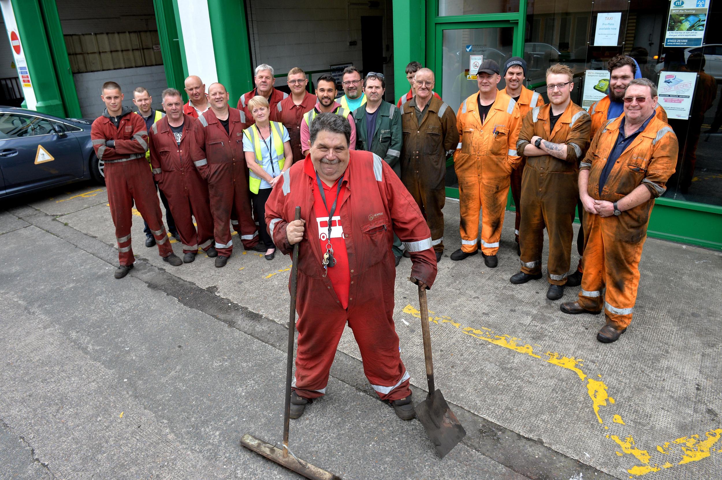 Mr Condon pictured with his colleagues