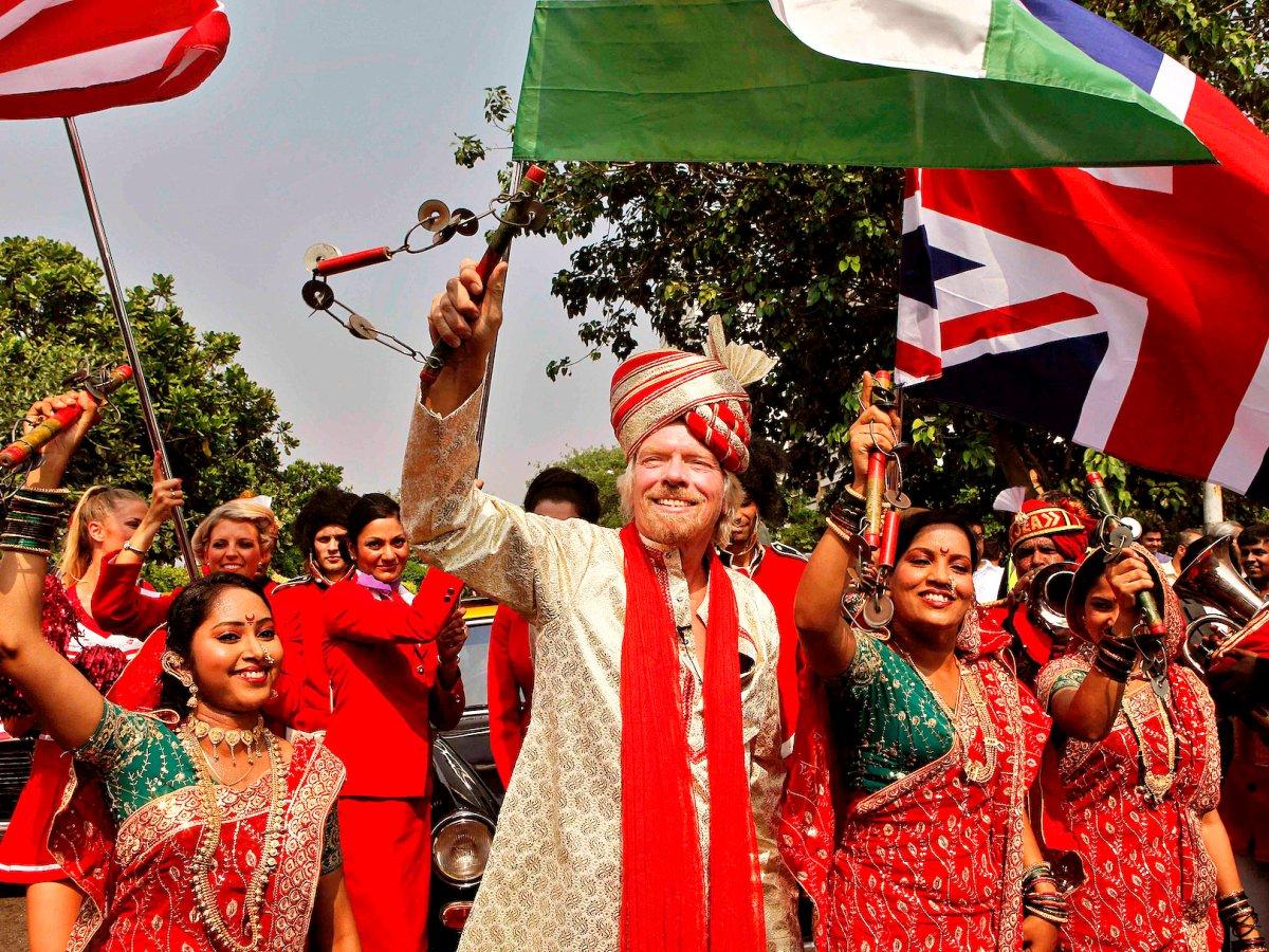 Virgin chairman Richard Branson celebrates Virgin Atlantic's expansion into India in Mumbai