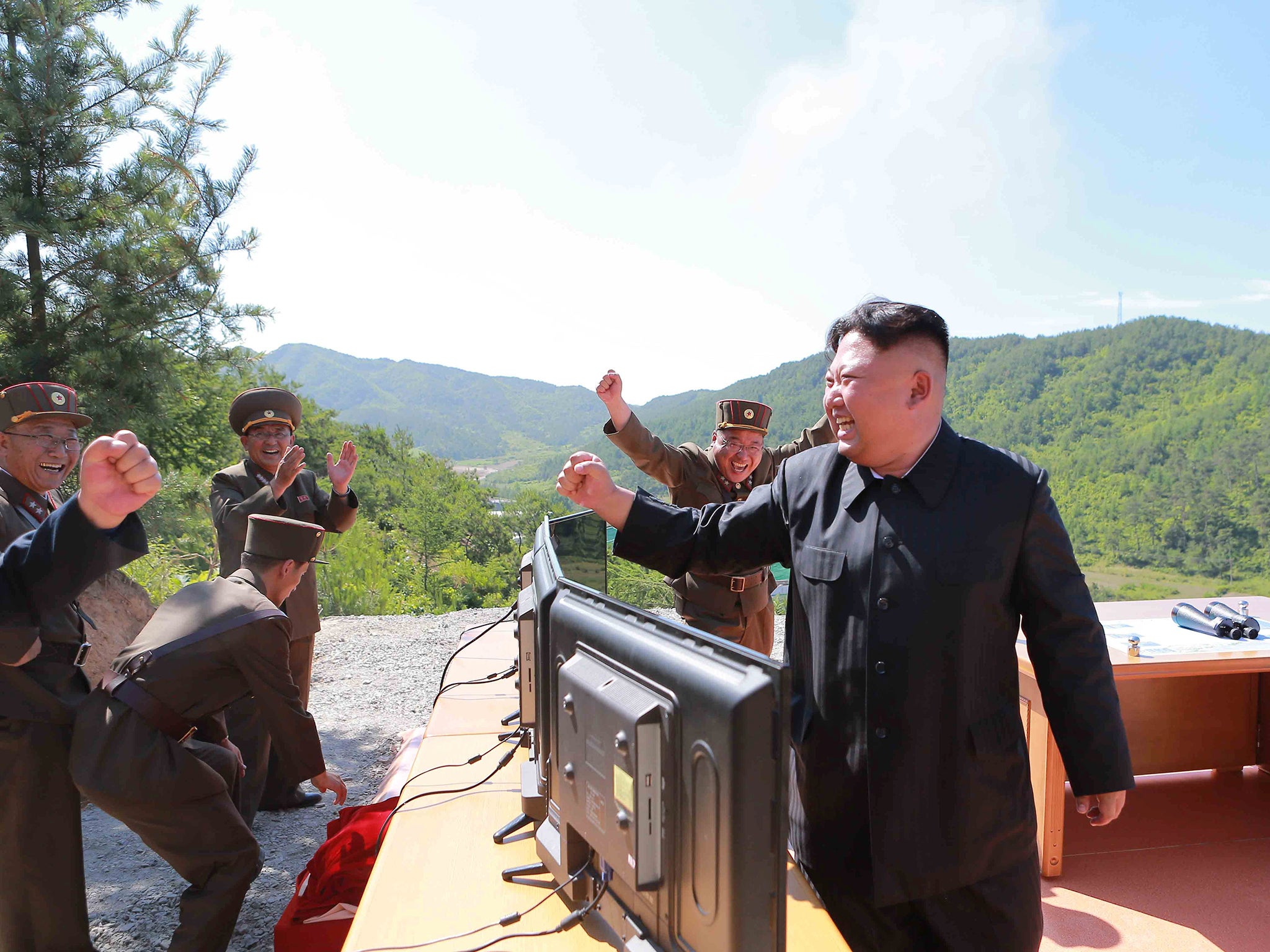 North Korean Leader Kim Jong-un celebrates the test-fire of the intercontinental ballistic missile Hwasong-14 (Reuters)