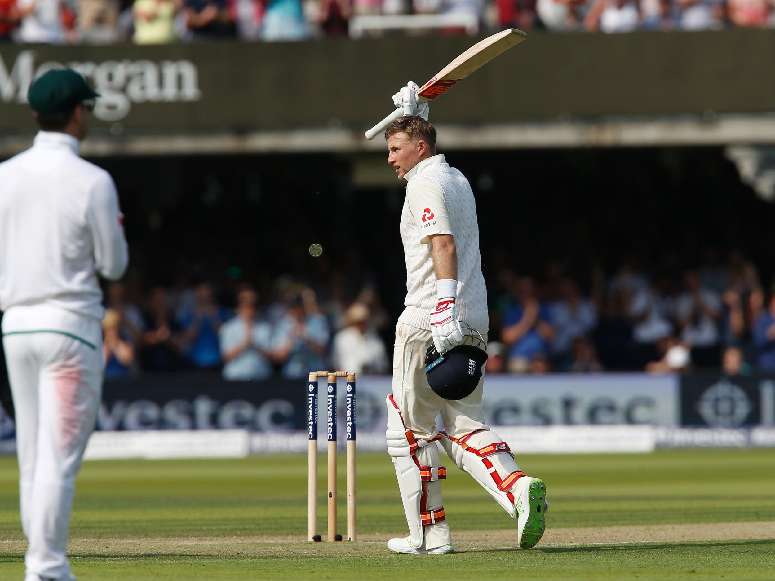 Root lifted his bat aloft for the first time as captain