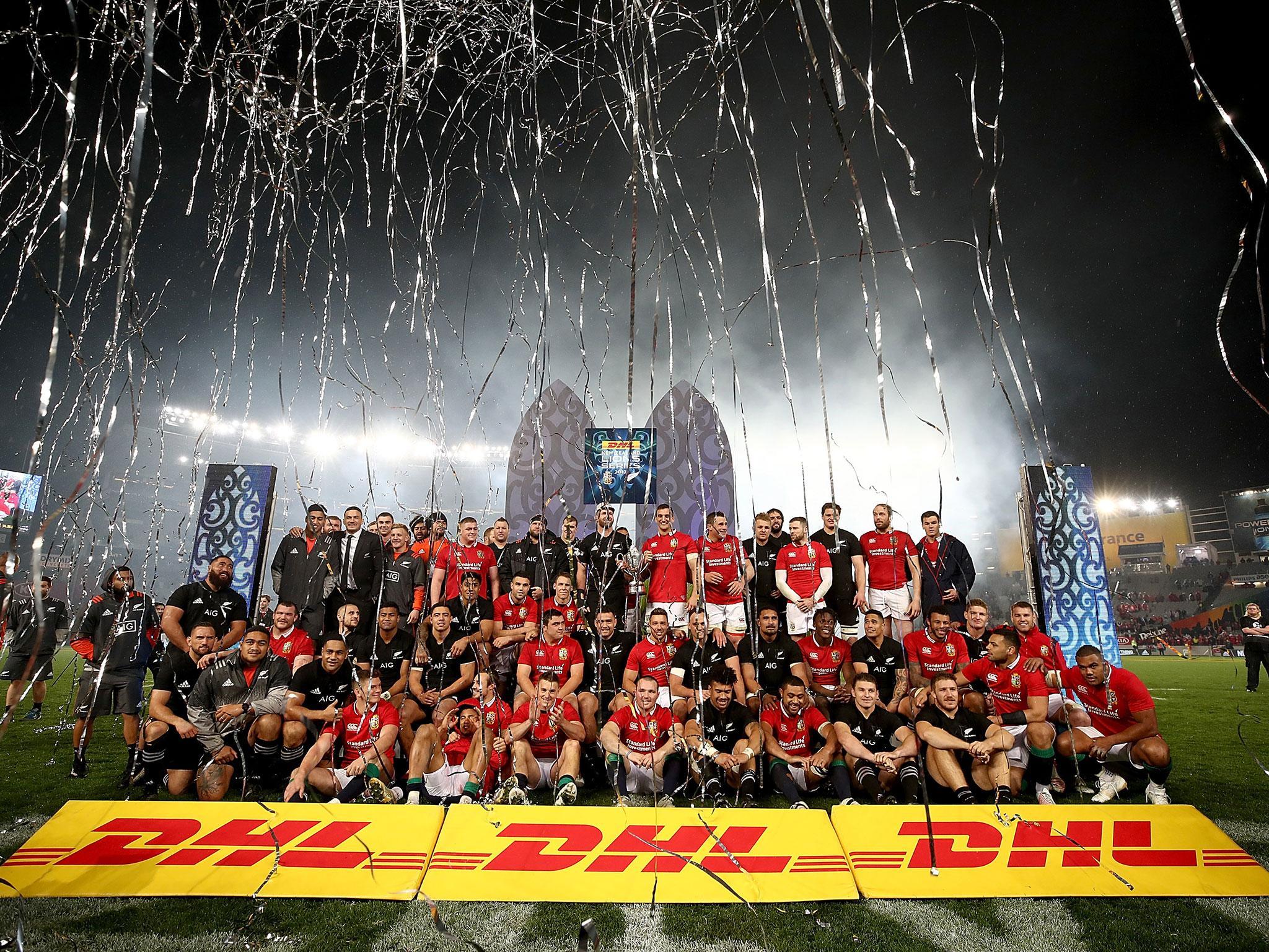 The two teams joined each other for a post-series photograph