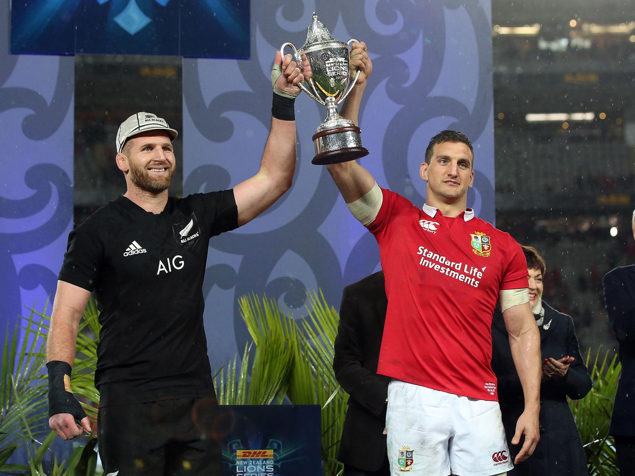 Centurion Kieran Read and Sam Warburton lift the Lions series trophy together