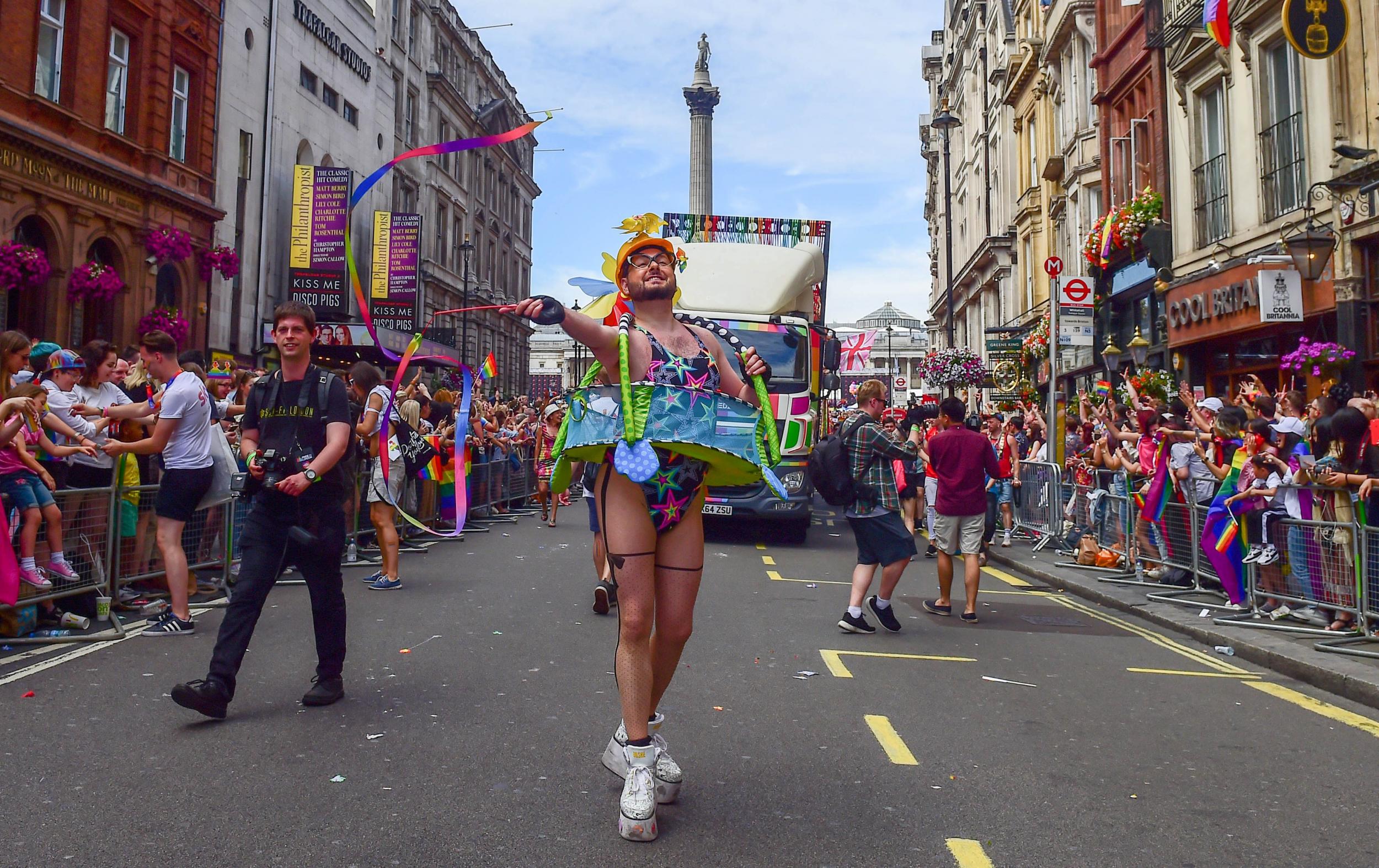The parade passes Nelson's Column as revellers take part in London Pride, the Lesbian, Gay, Bisexual, and Transgender (LGBT) parade in London,