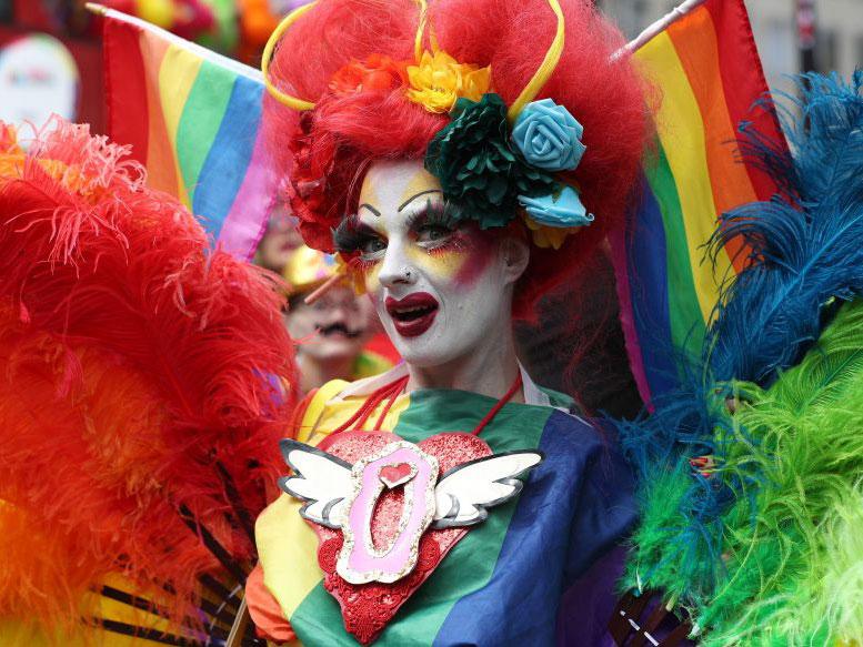 People take part in the Pride in London Parade in central London (Jonathan Brady/PA Wire )