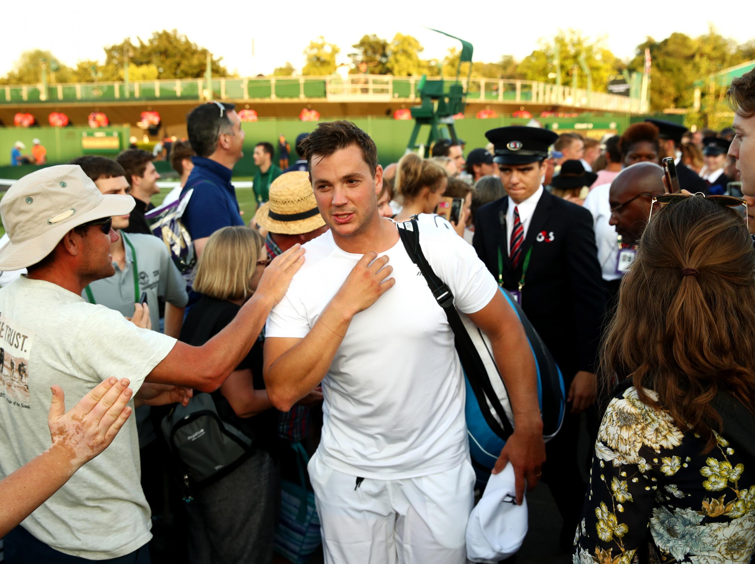 The pair were given a heroes' reception as they left the court