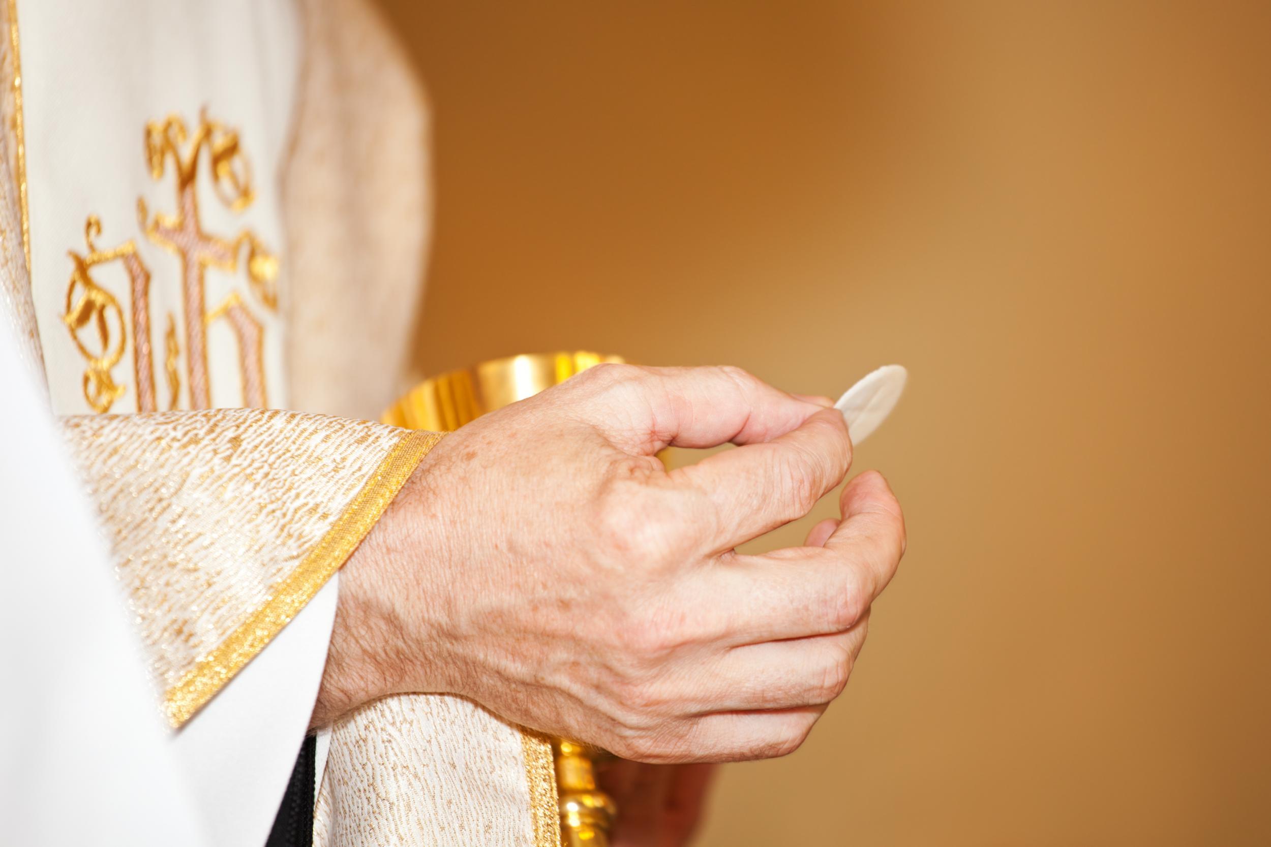 &#13;
Roman Catholics believe that the bread and wine served at the Eucharist are converted into the body and blood of Christ through a process called transubstantiation&#13;