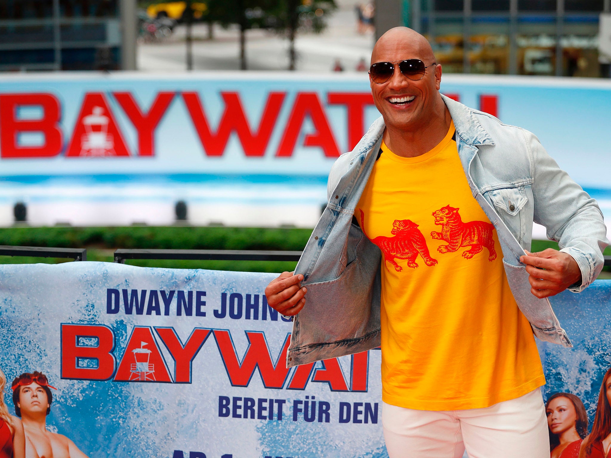 Dwayne Johnson poses for photographers during a photocall to promote the Europe premiere of 'Baywatch'