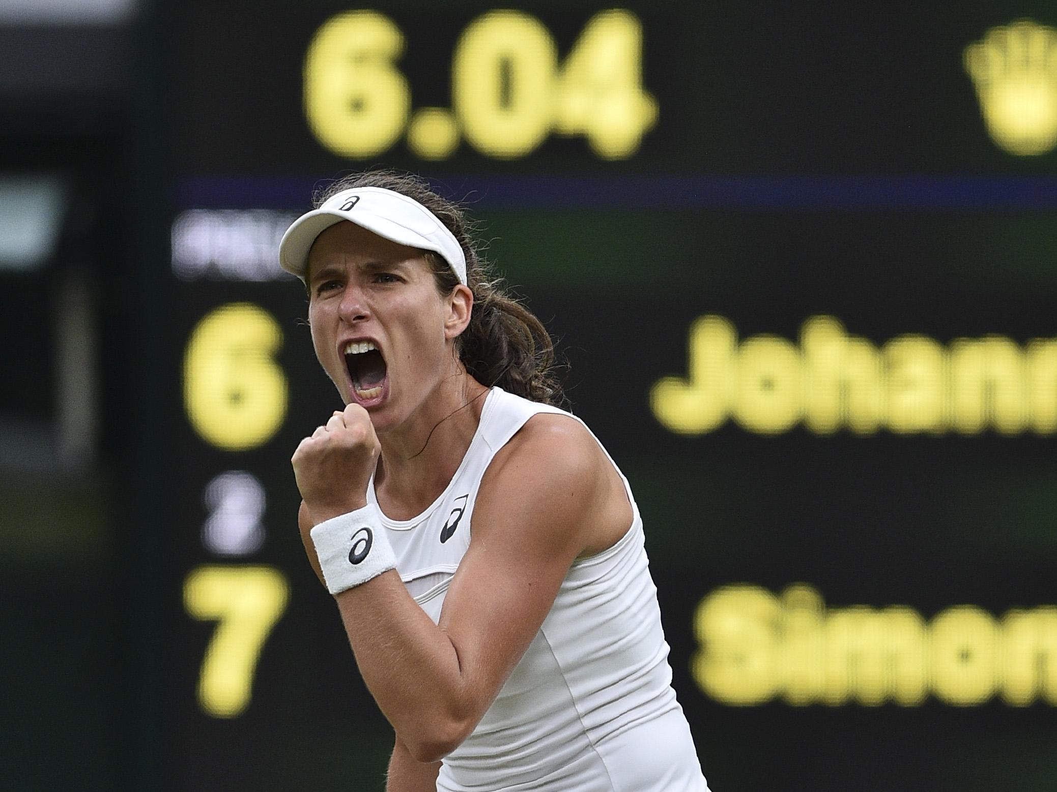 Konta celebrates a brilliant victory on Centre Court