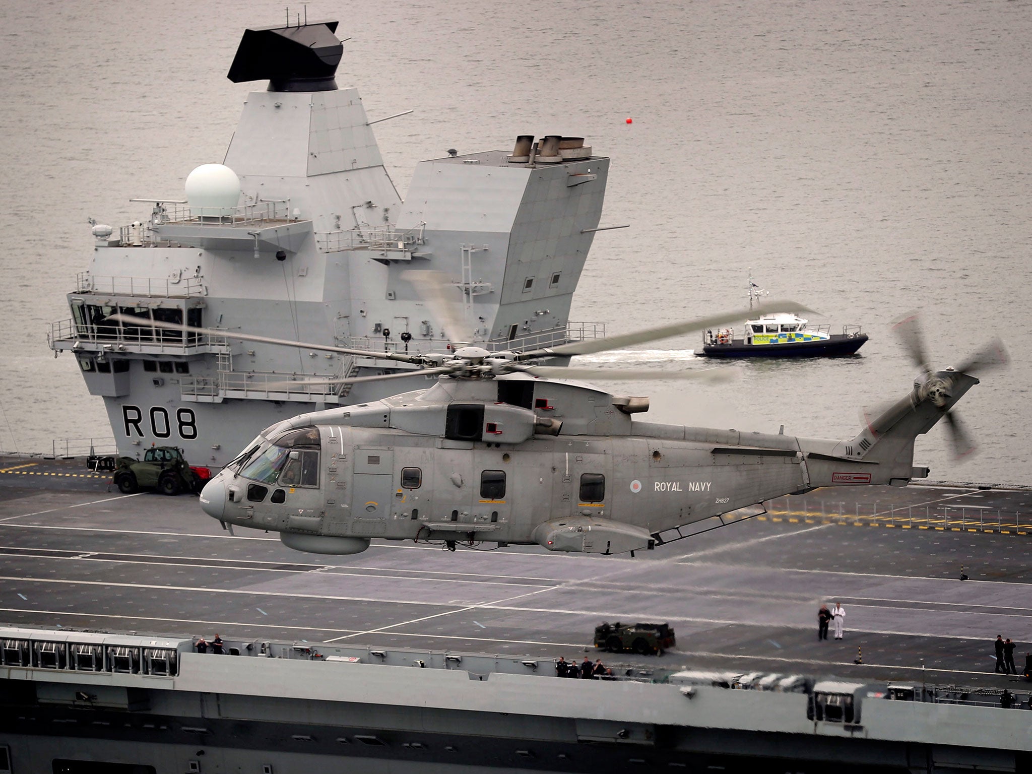 HMS Queen Elizabeth, one of two new aircraft carriers for the Royal Navy, leaving the Rosyth dockyard near Edinburgh to begin her sea worthiness trials on 26 June