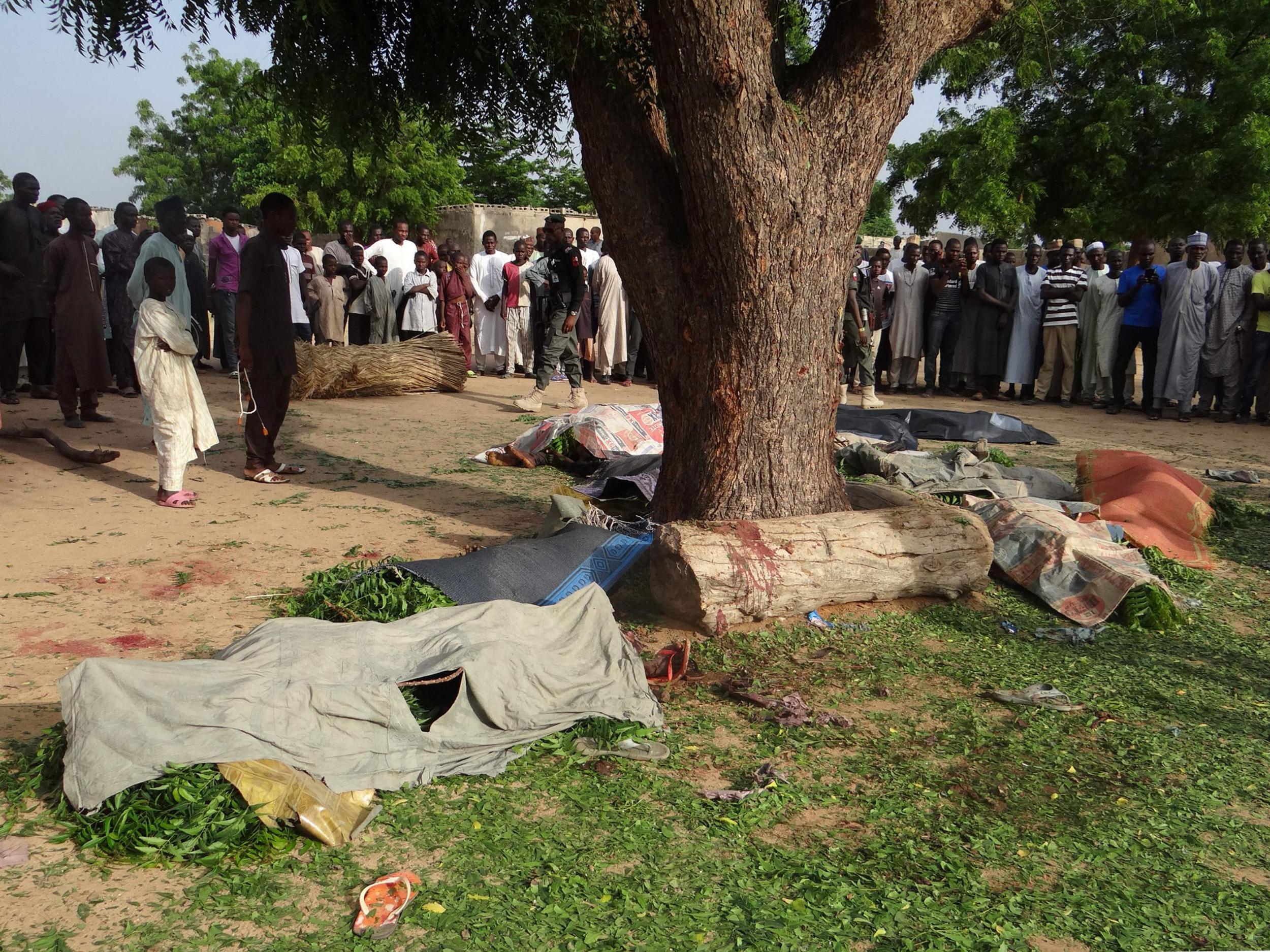 People gather to mourn the deaths in Maiduguri