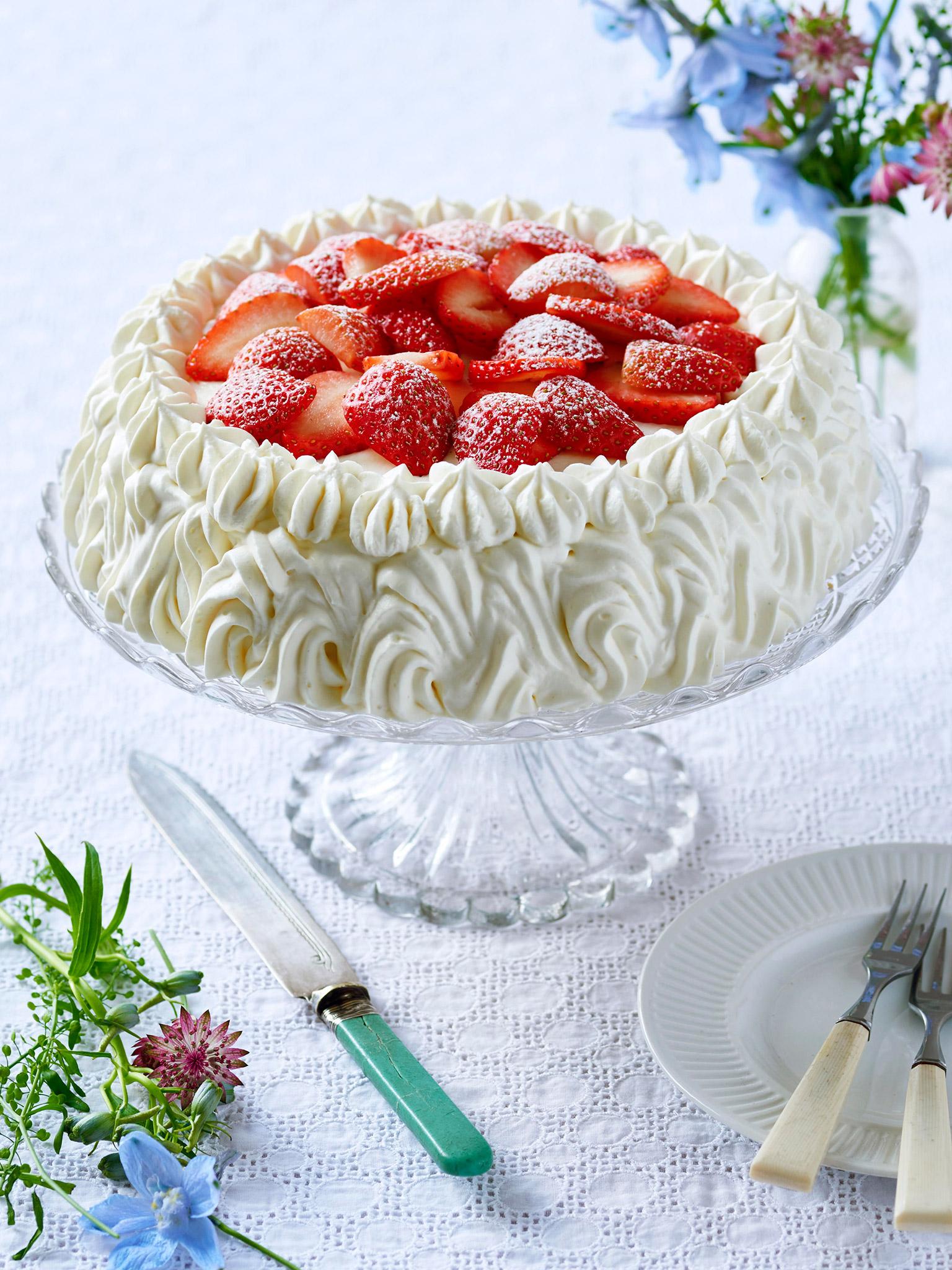 A strawberry cream cake featured in Aurell's The ScandiKitchen cookbook