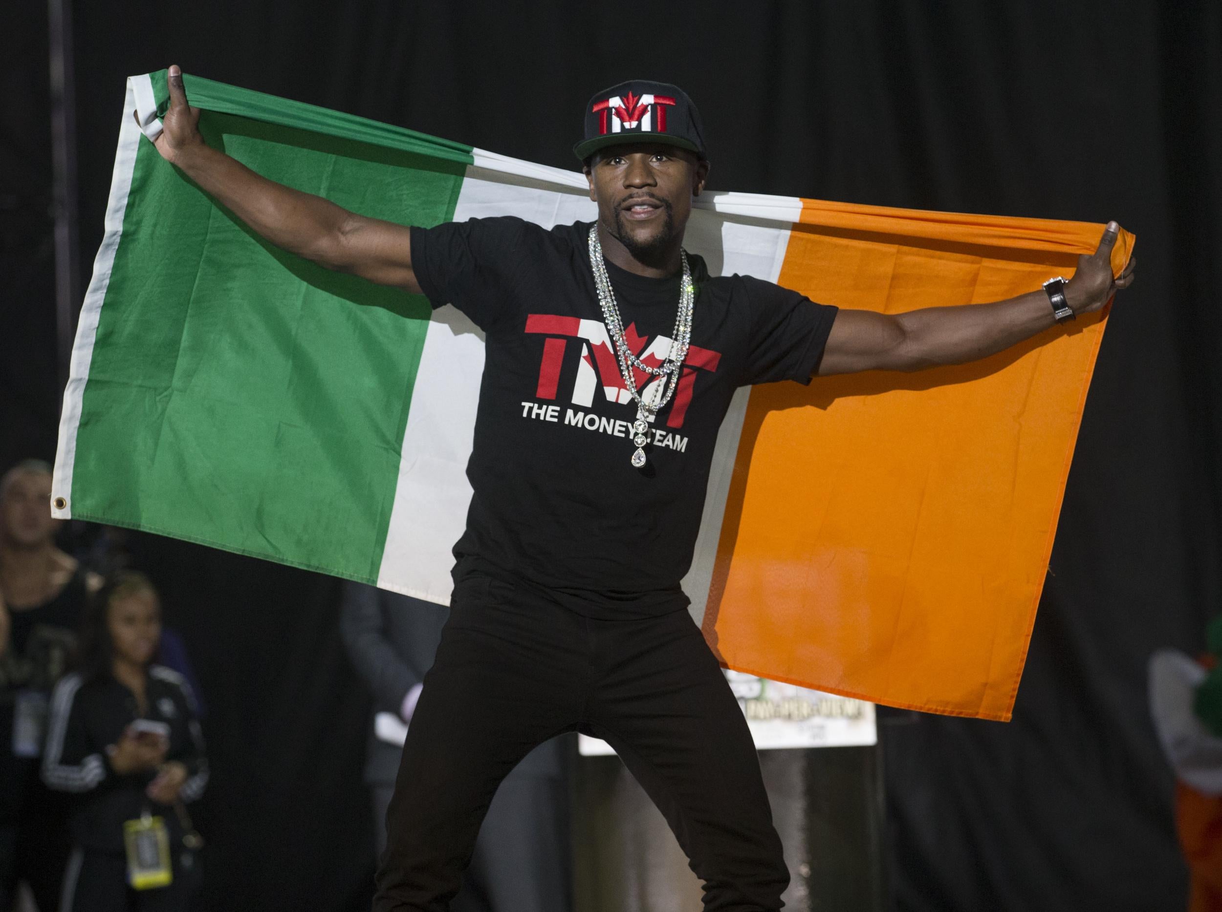 Mayweather irritated McGregor by posing with an Irish flag (Getty )