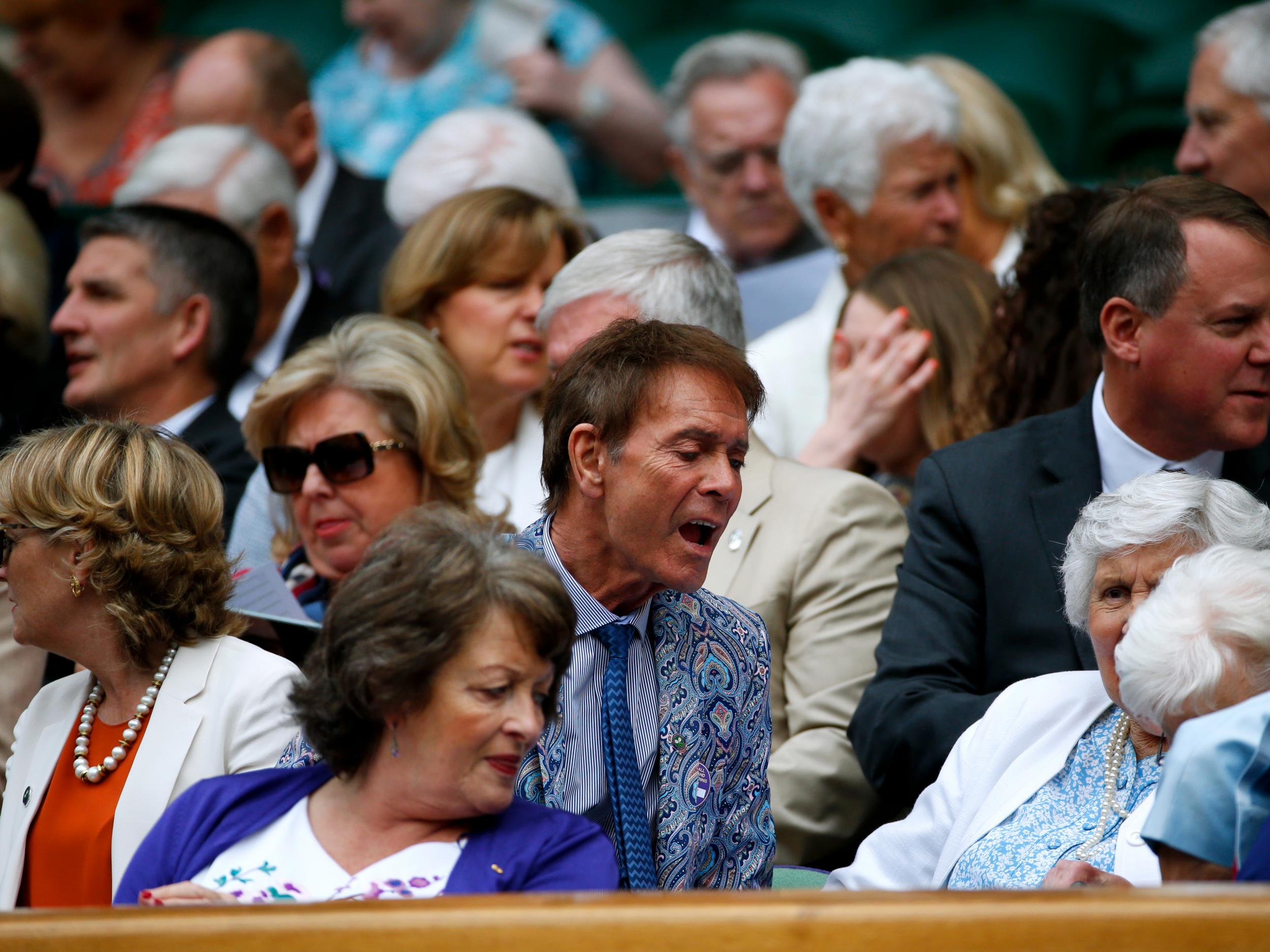 Sir Cliff Richard looks on from the centre court royal box on day ten of the Wimbledon Lawn Tennis Championships