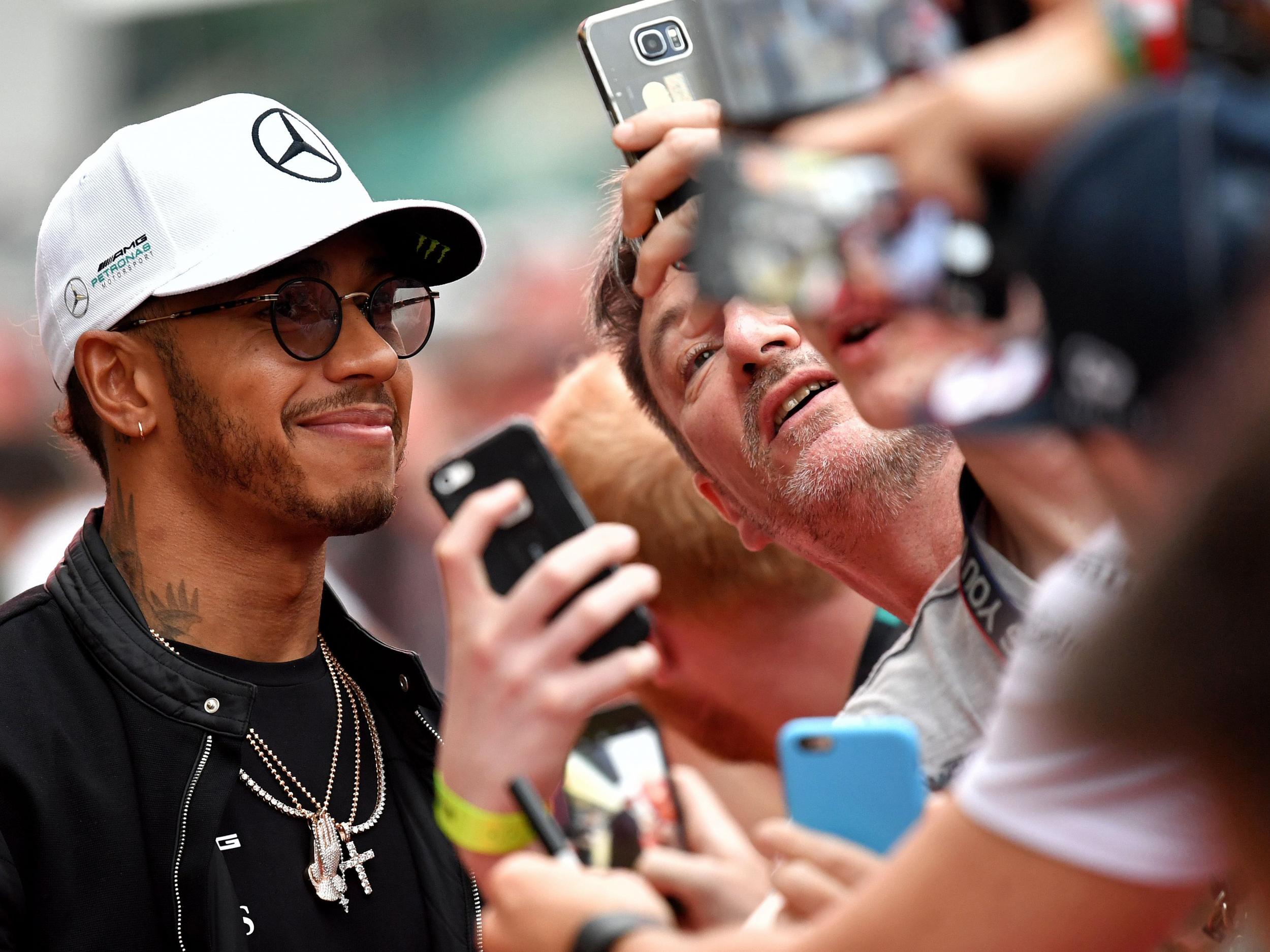 Lewis Hamilton insisted he gives plenty back to his fans