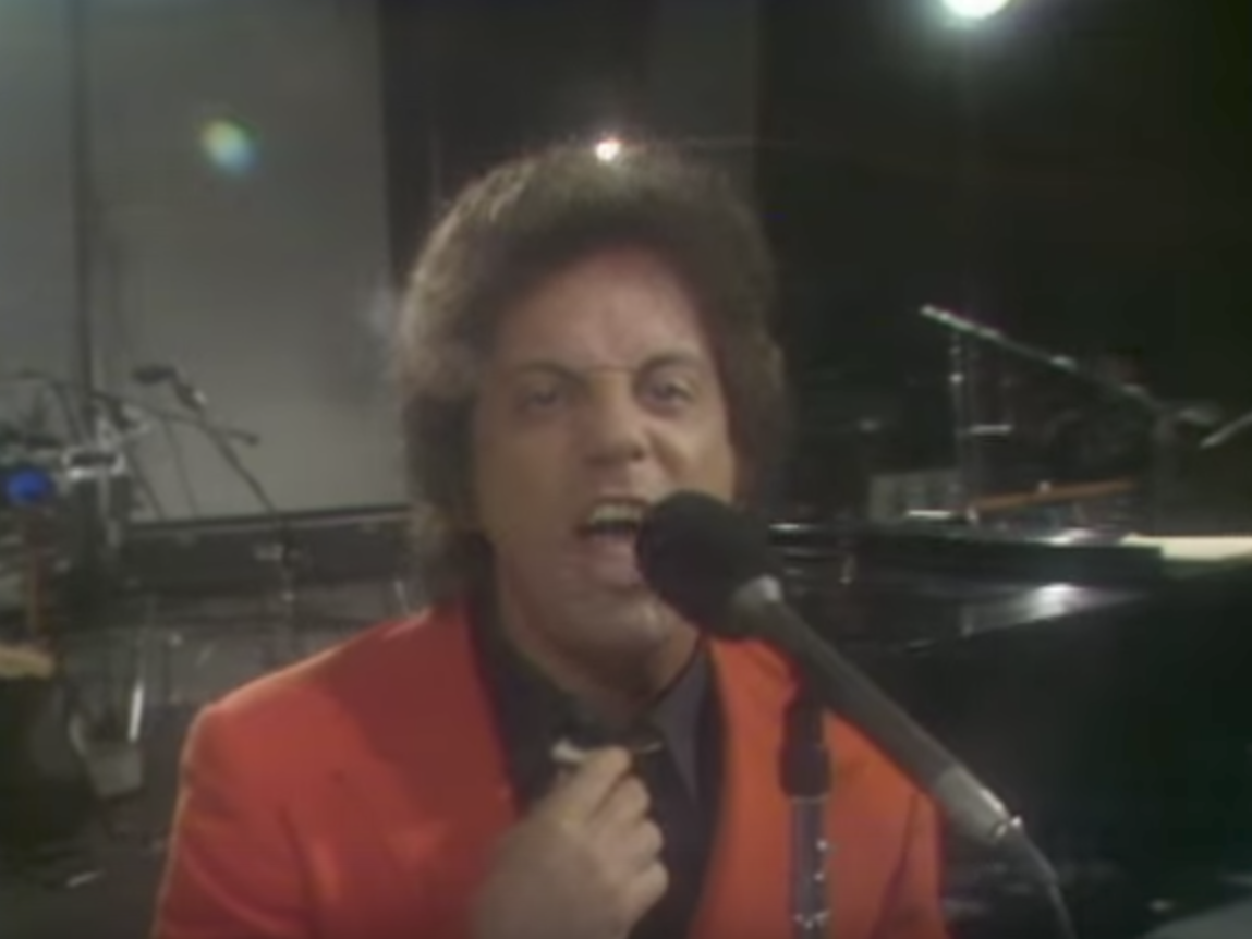 Billy Joel in the "It's Still Rock and Roll to Me" music video