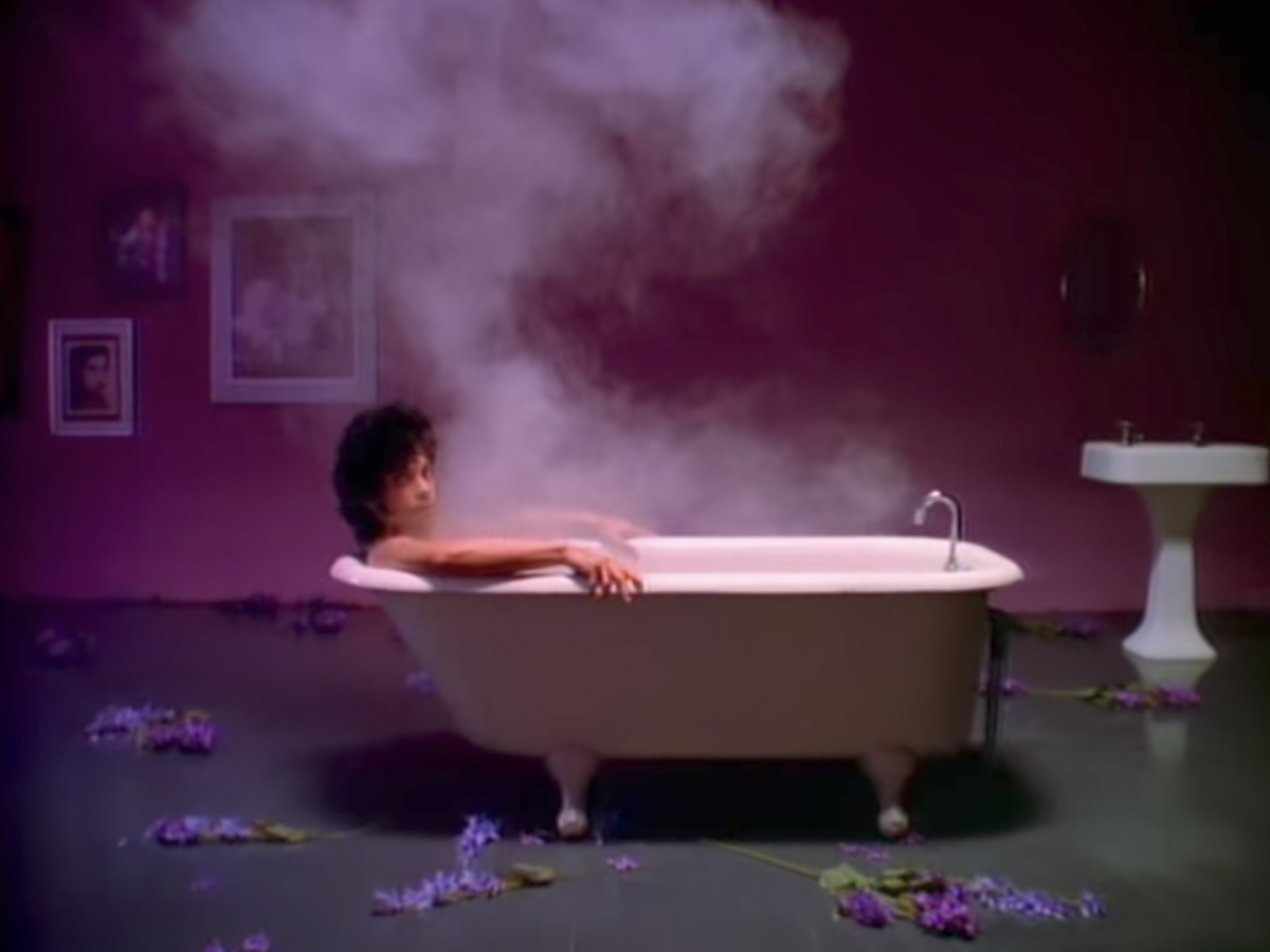 Prince starts the video in a bathtub.