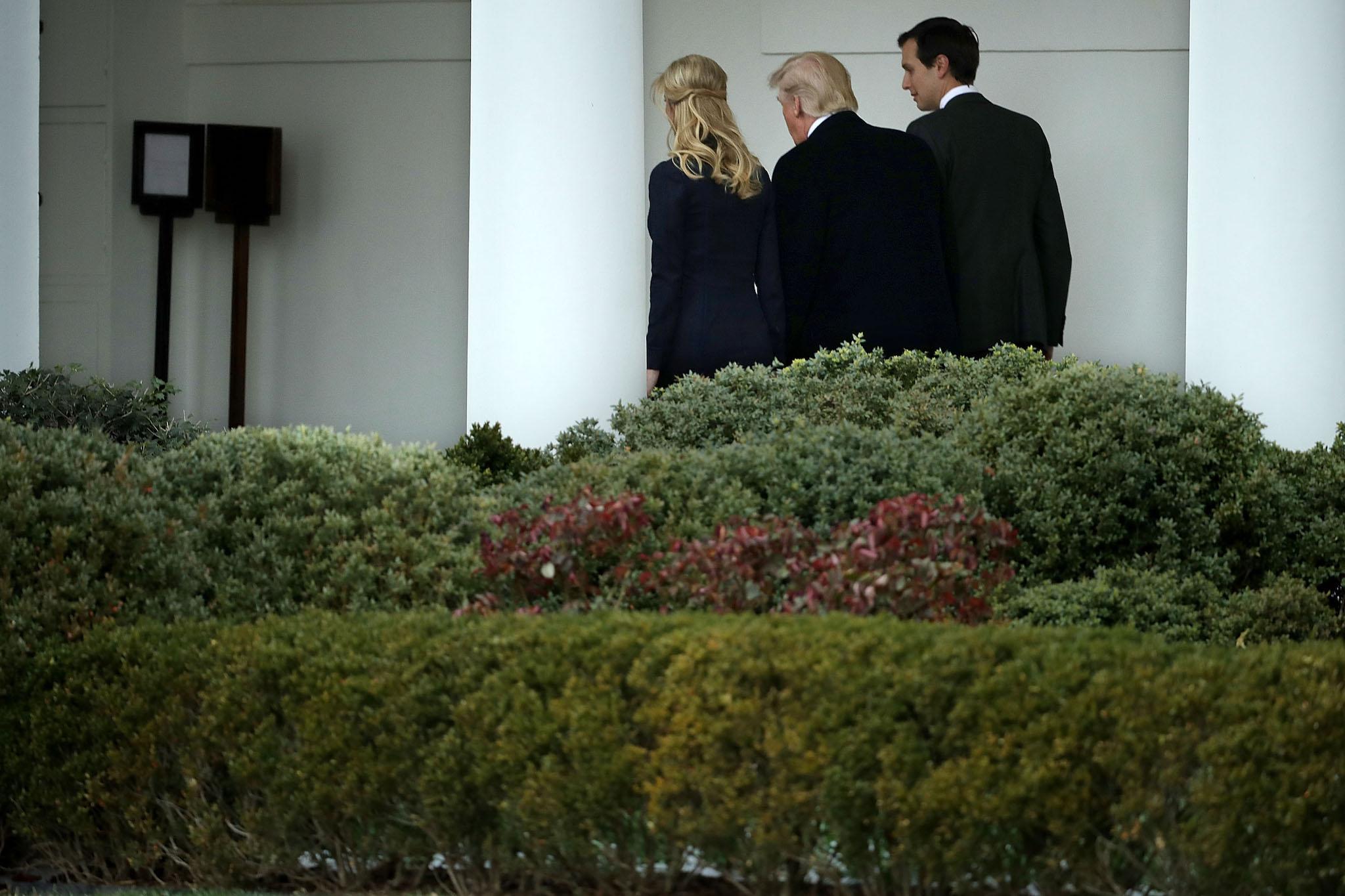 President Donald Trump walks along the West Wing colonnade with his daughter Ivanka Trump and his son-in-law and Senior Adviser Jared Kushner