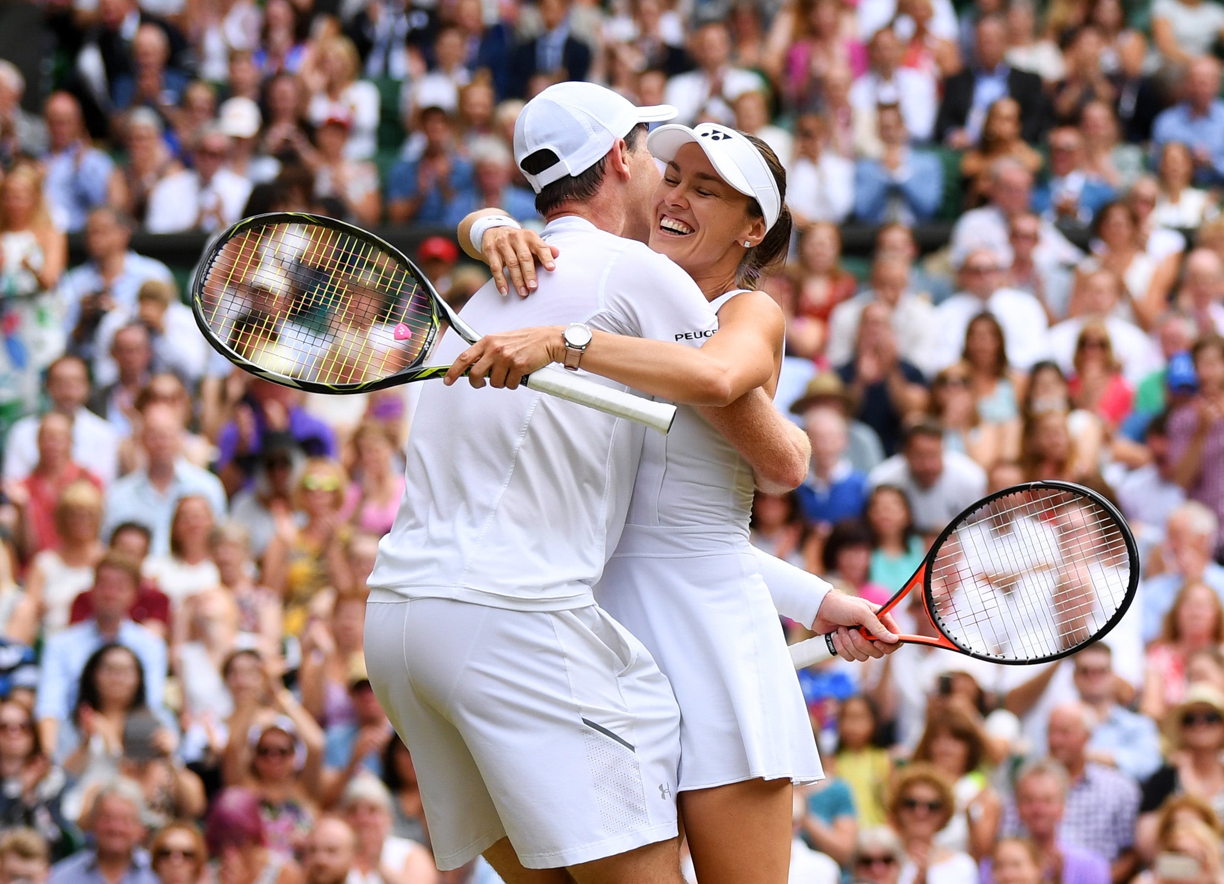 Murray and Hingis celebrate after their first Grand Slam title together