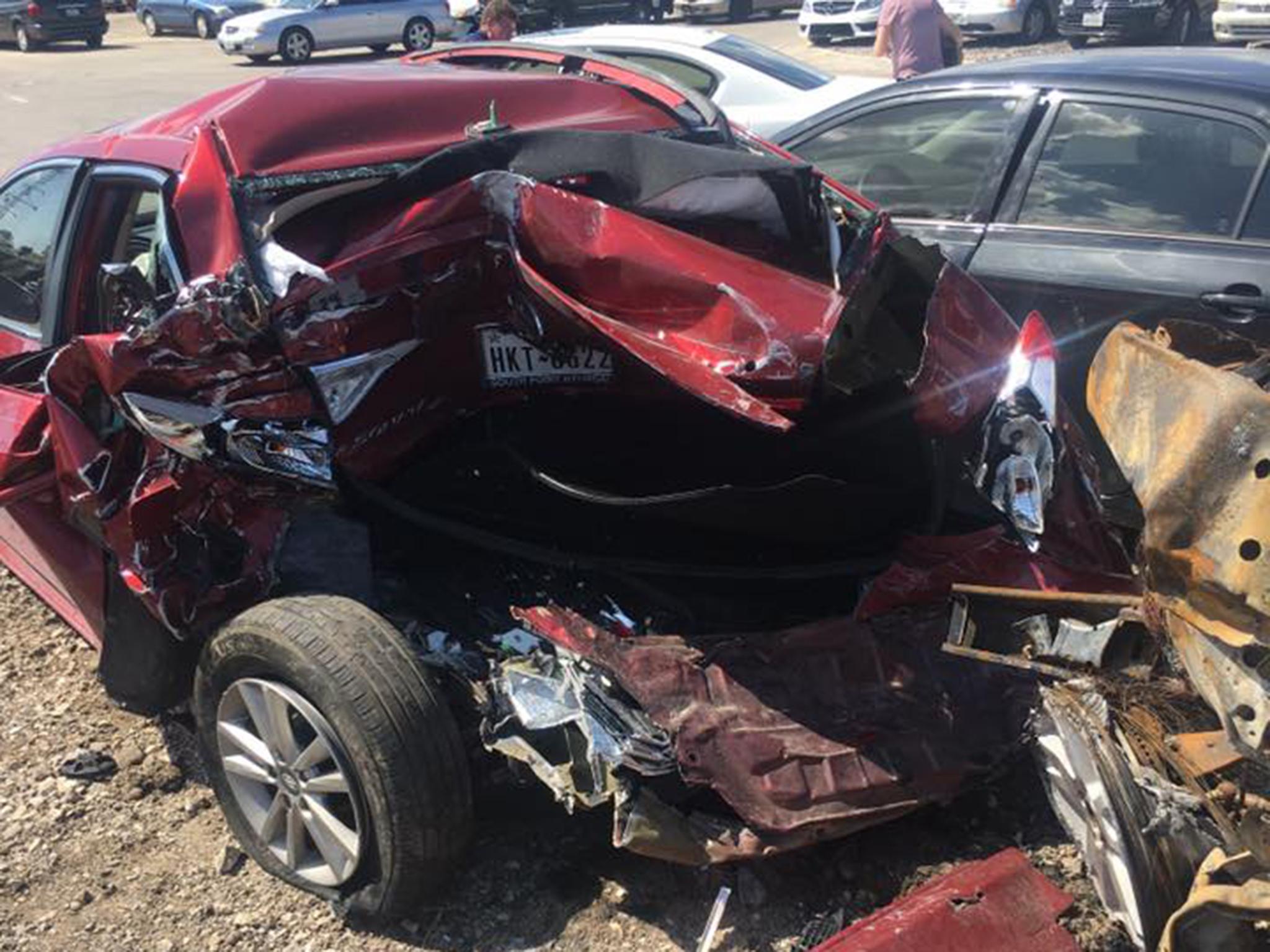 A truck crushed the vehicle from behind