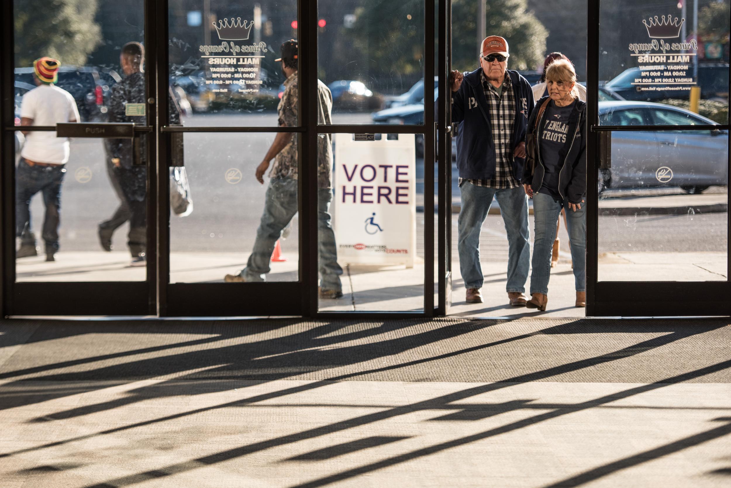 People enter the Prince of Orange Mall, a polling location for the South Carolina Democratic presidential primary