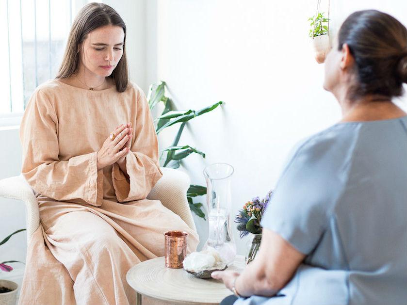 Deborah Hanekamp, a self-described 'seeress' and energy healer, sees a client in her New York City studio