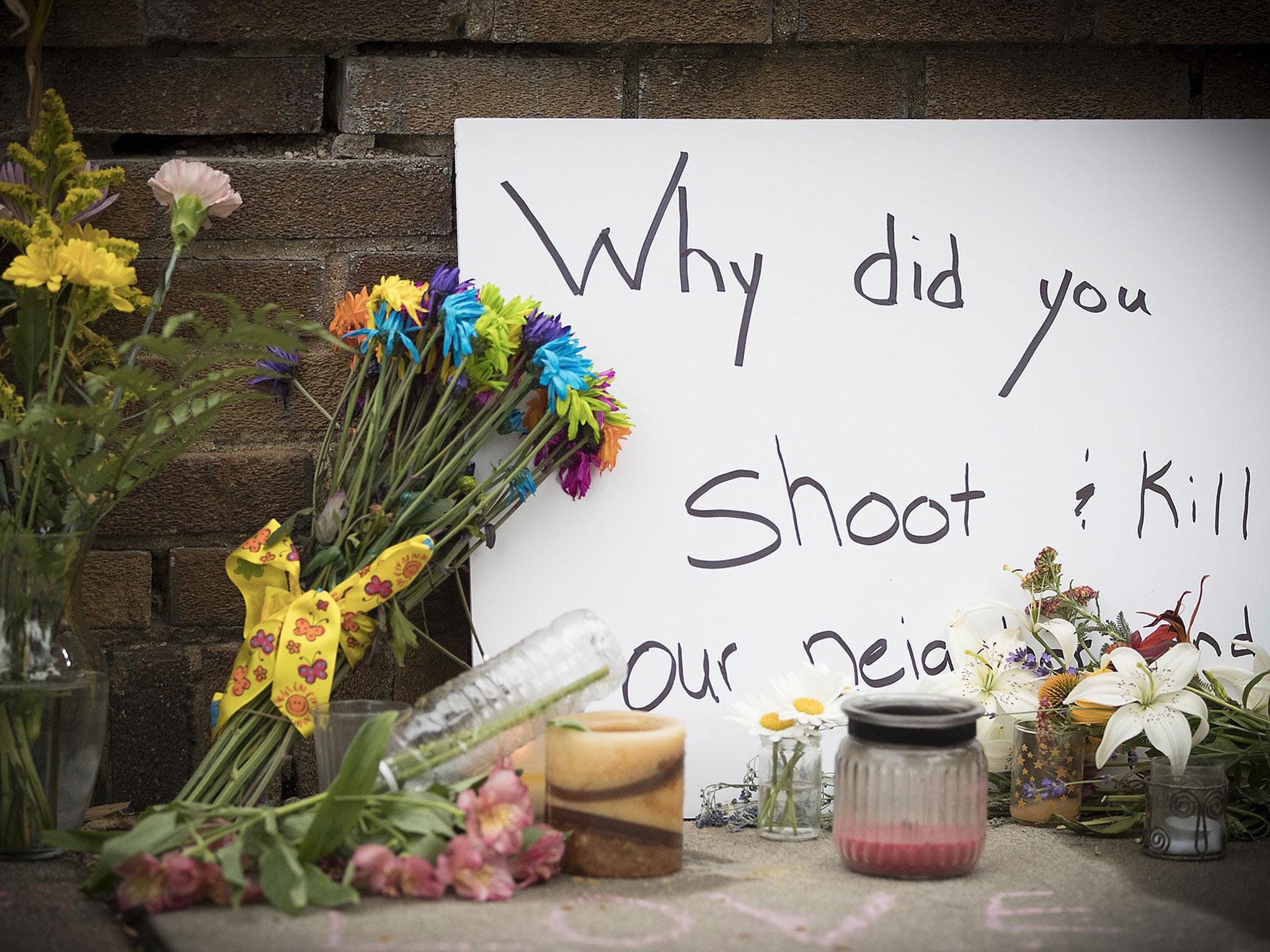 A makeshift memorial is left at the scene where a Minneapolis police officer shot and killed Justine Damond