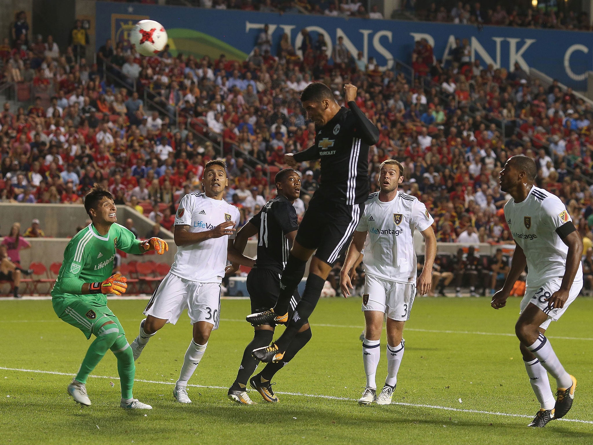 Chris Smalling with a headed attempt on goal