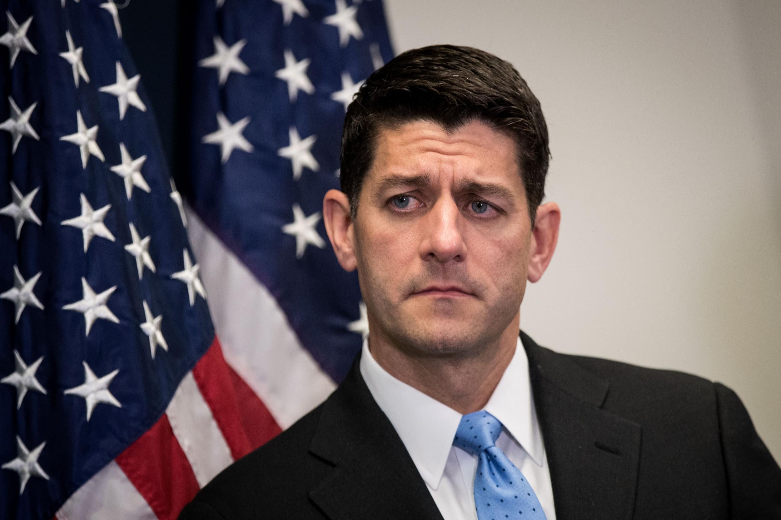 Speaker of the House Paul Ryan looks on during a press conference following a closed-door House GOP conference meeting on Capitol Hill