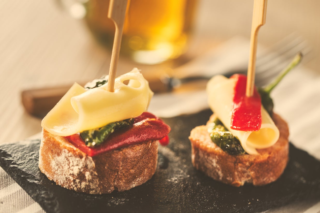 Grab some pintxos for a quintessentially Spanish snack (Getty/iStockphoto)