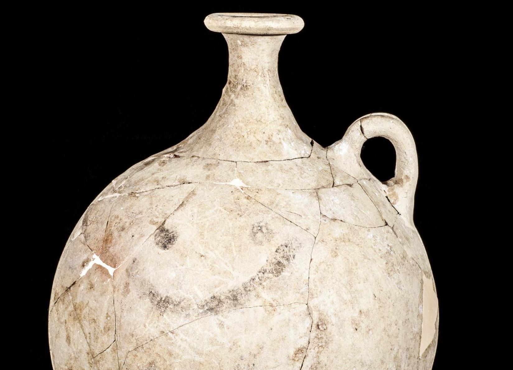 Found in a burial chamber, the smiley jug was used for a sweet sherbet-like drink and dates back to 1,700 BC