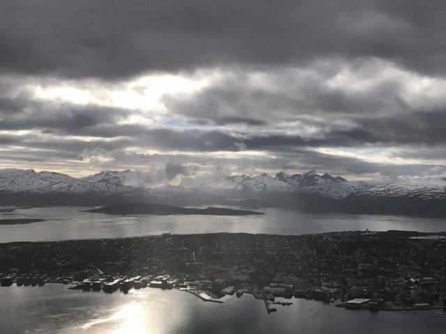 Steely grey skies over the harbour at Tromso, a city with a no-nonsense attitude to living (Josie Cox)