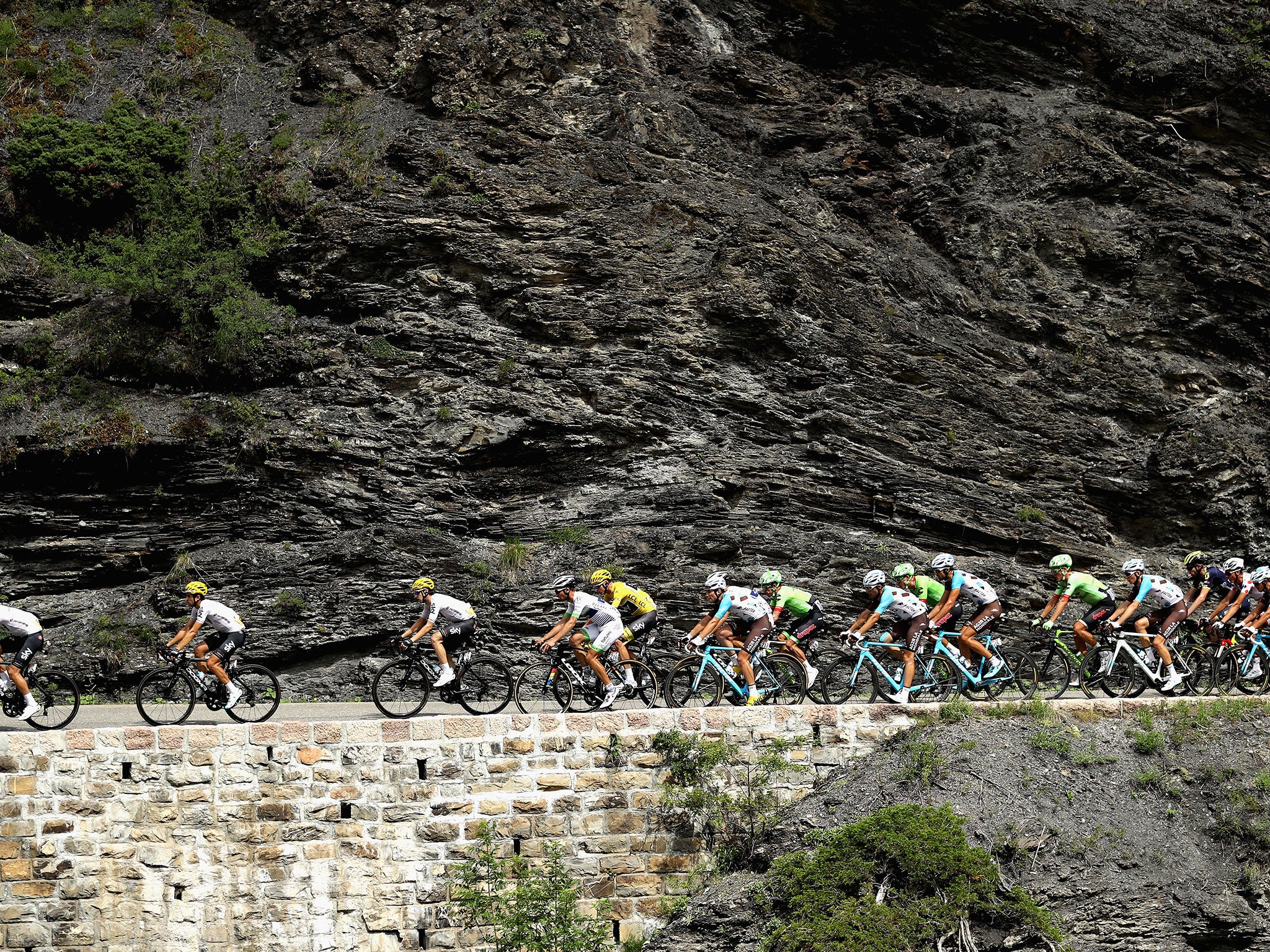 Froome can be seen in the centre of the pack during stage 18