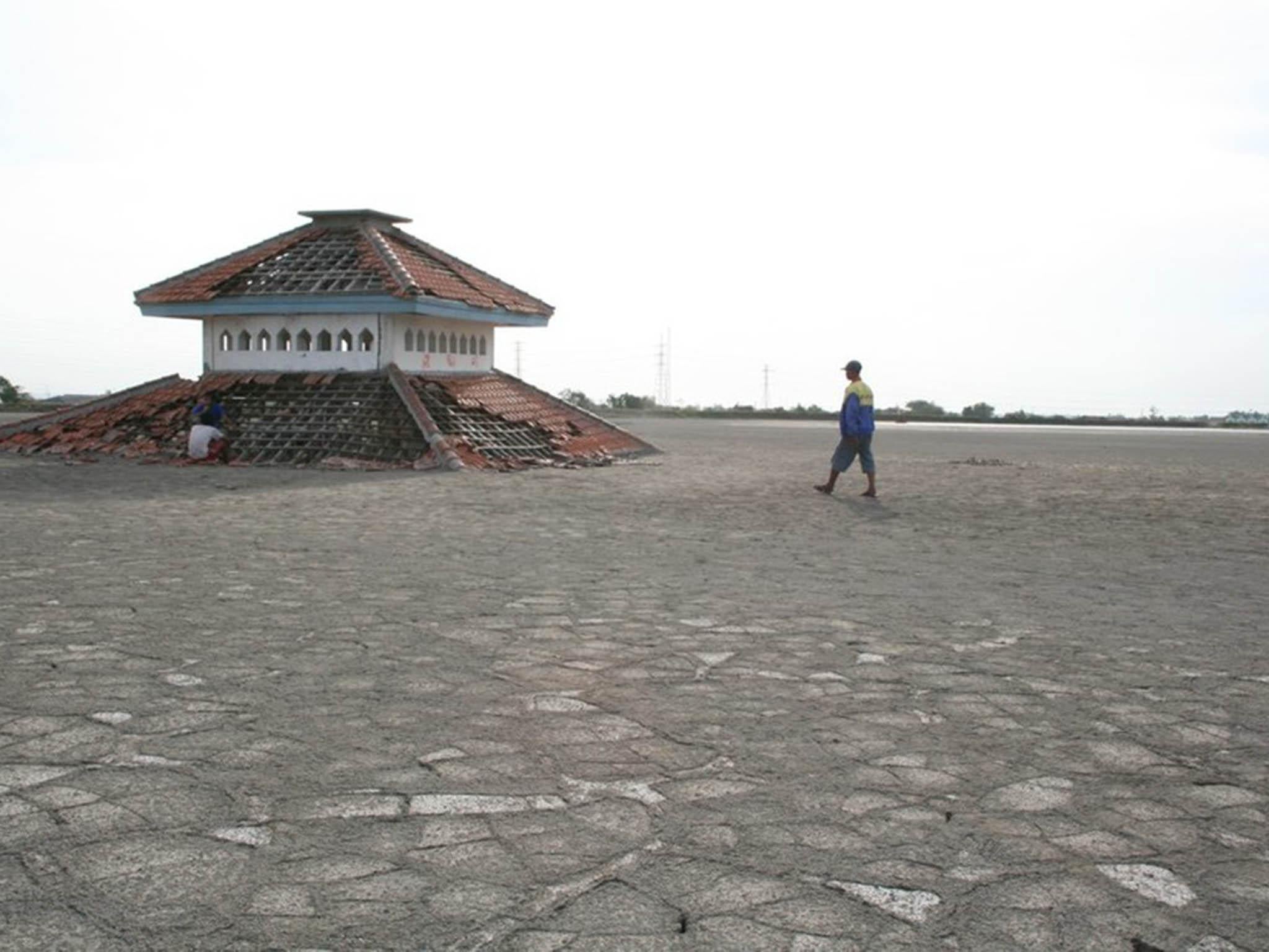 Now abandoned, part of Sidoarjo town is entombed in mud metres-thick – and its just one of several villages buried