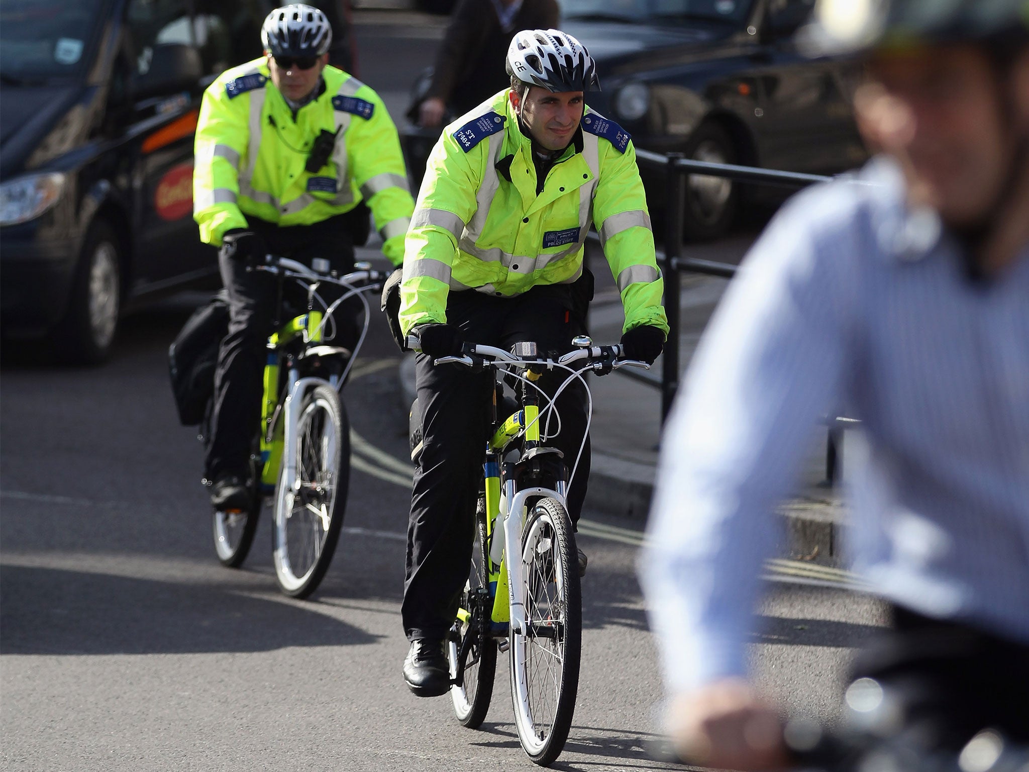 Community Support Officers cycle through central London