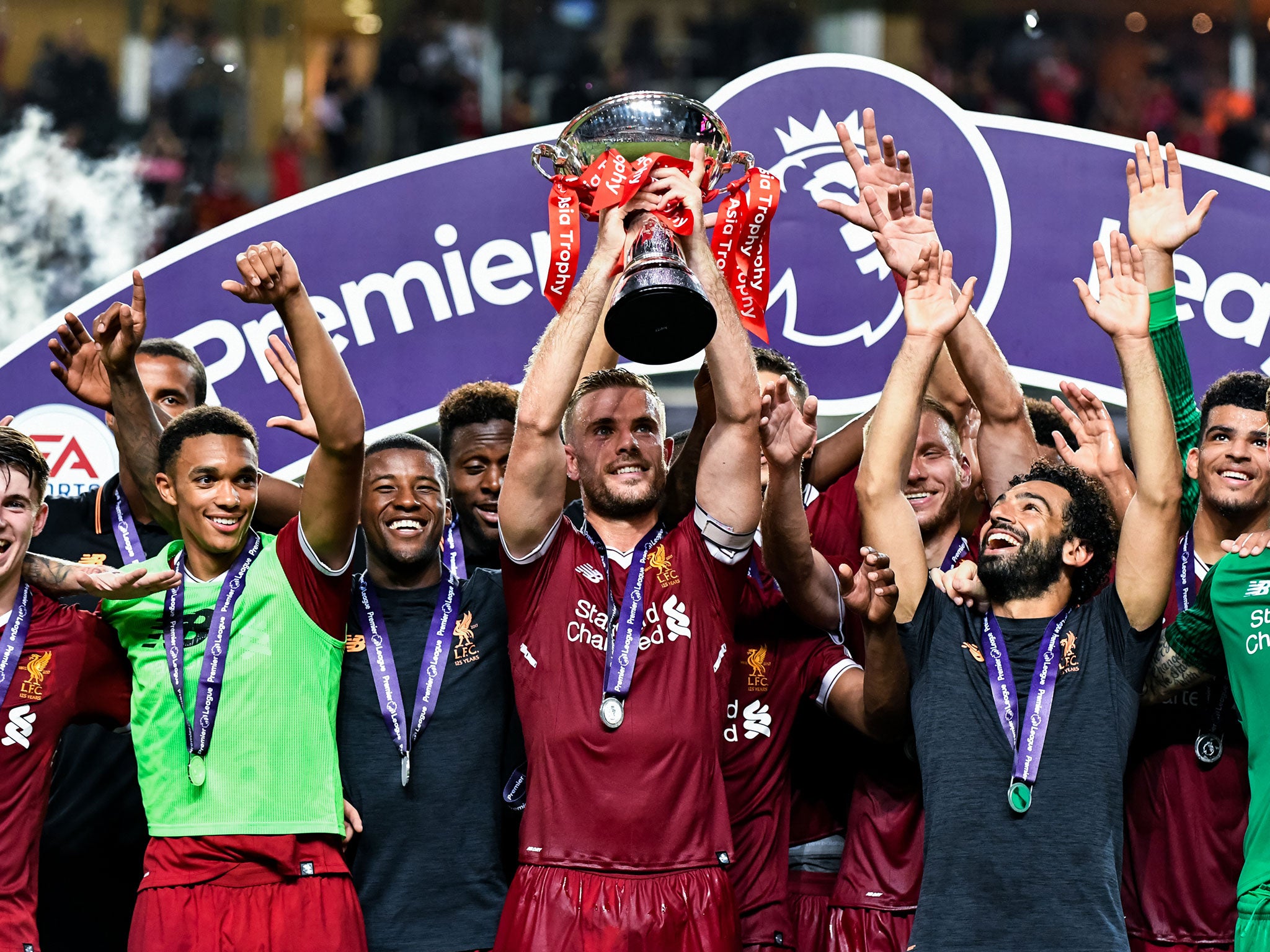 Henderson lifts the Premier League Asia Trophy