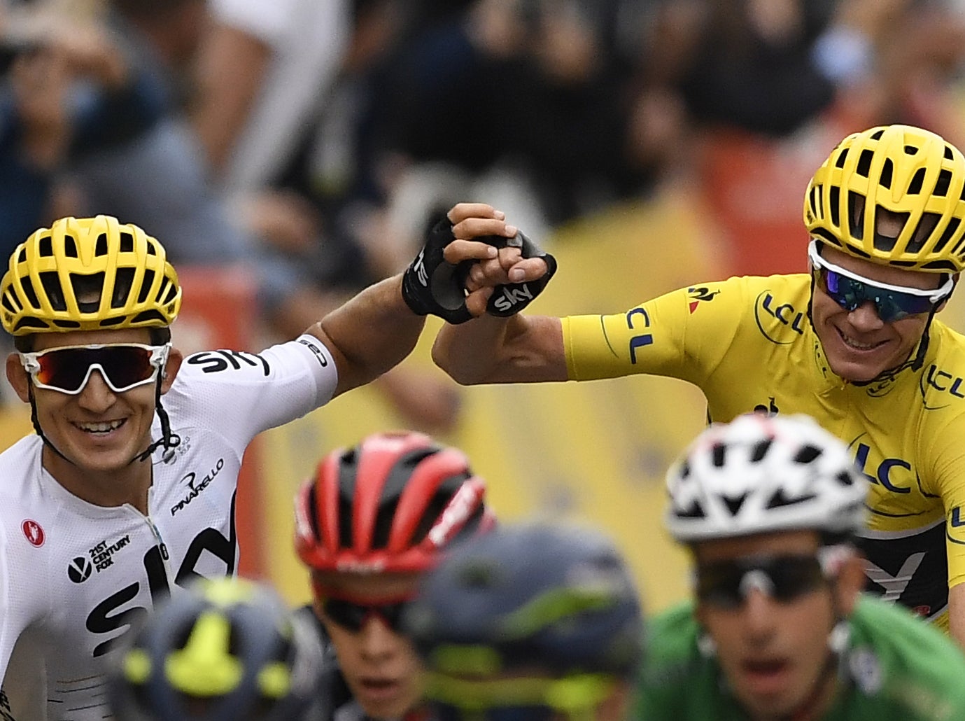 Froome celebrates with his teammate Michal Kwiatkowski