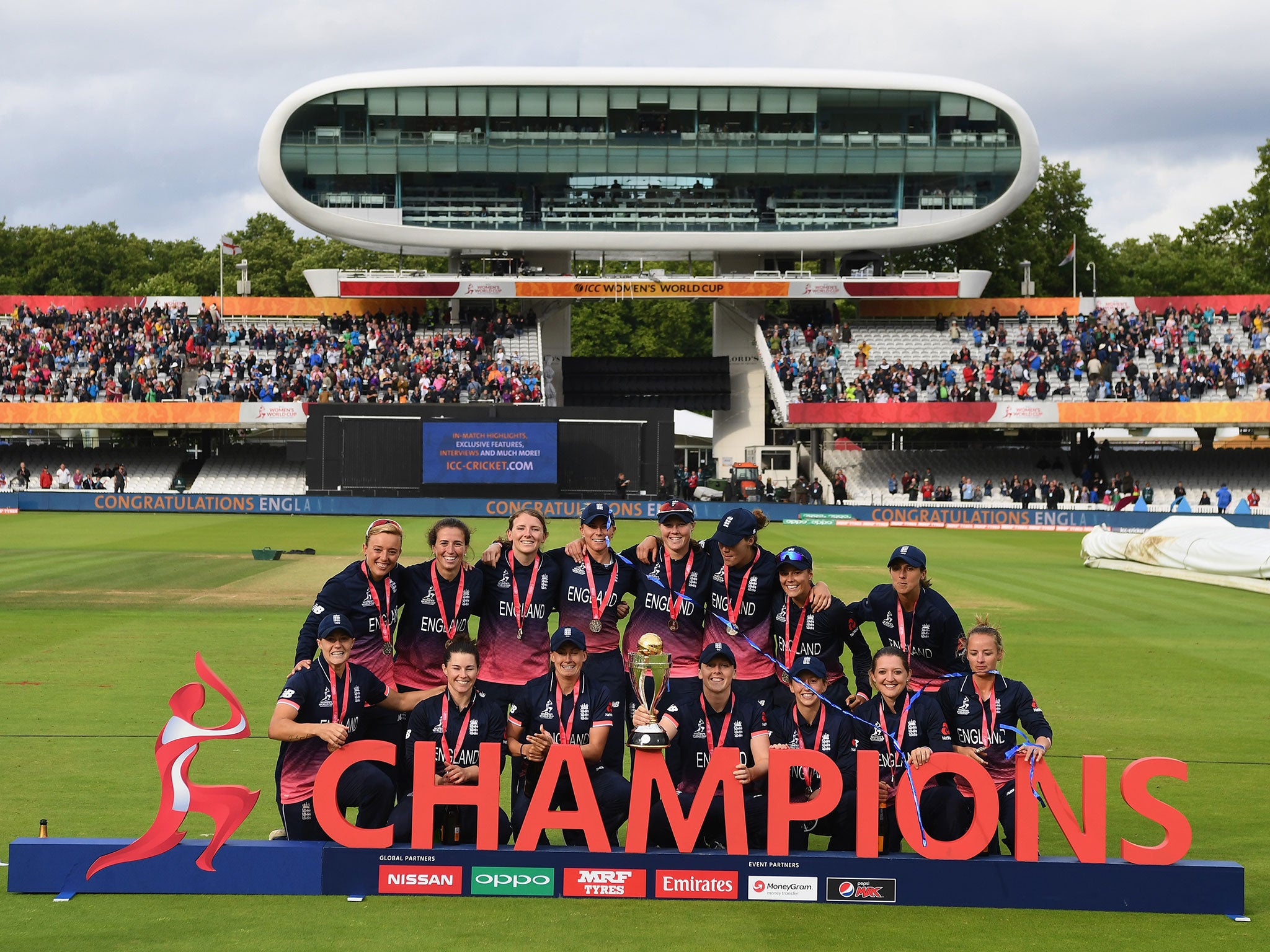 England Women are presented with the World Cup trophy