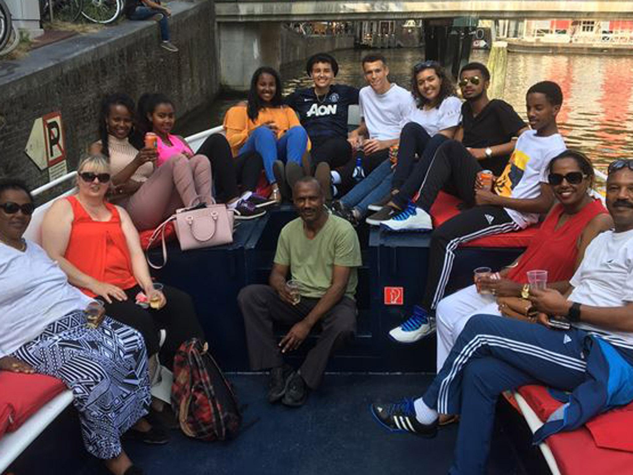 Aster Abebe (fifth from left) reunited with her family in Brussels after the ordeal