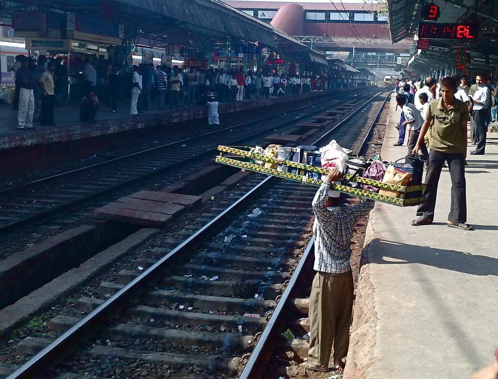 Carried on large crates, the dabbas are moved by train across the city