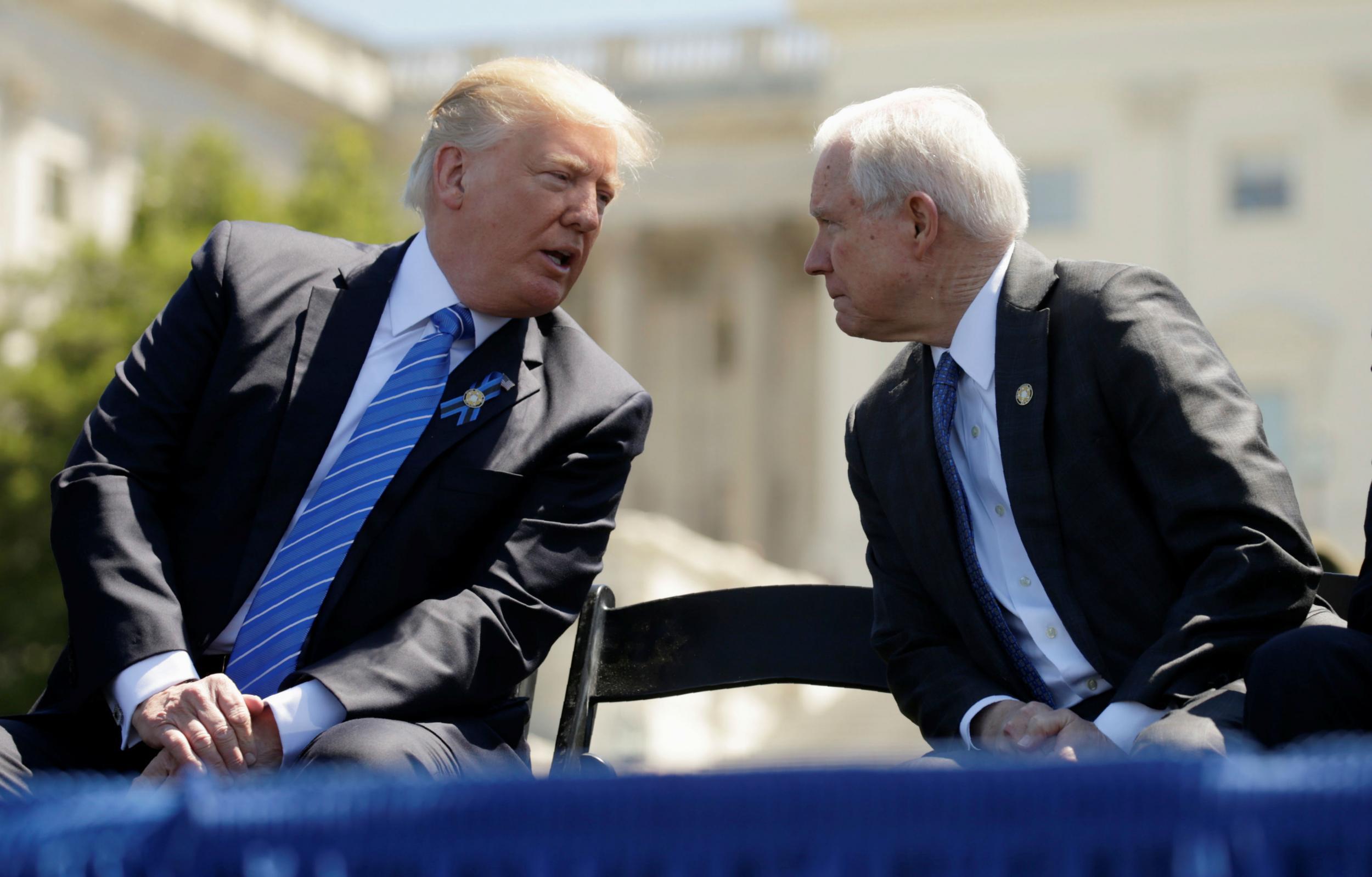 President Donald Trump speaks with Attorney General Jeff Sessions in happier times in May