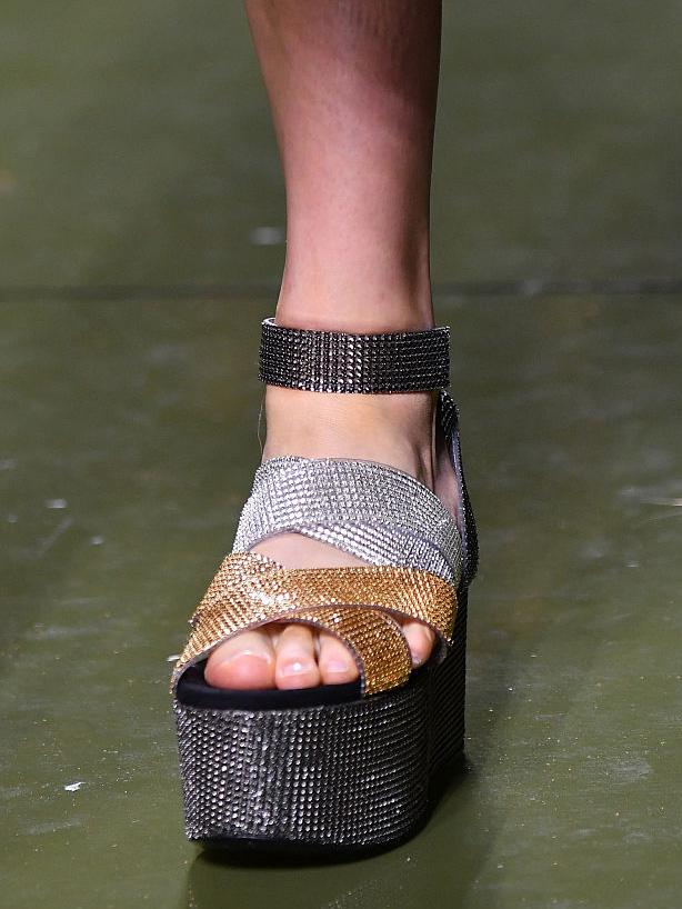 Balmain daubed their chunky flatforms with glitter and metallic straps