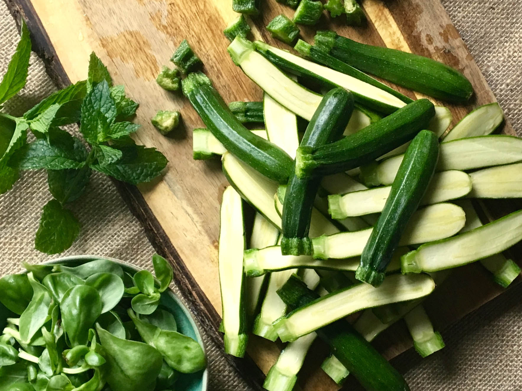 The key is to slice the courgettes in half lengthways but leave the stem