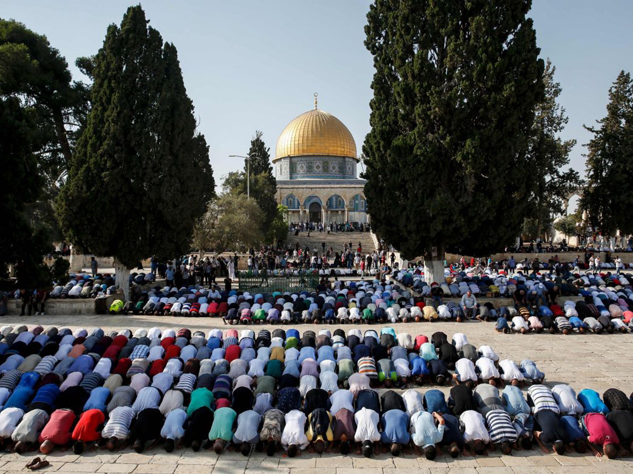 Muslims pray inside the Haram al-Sharif compound yesterday, known to Jews as the Temple Mount