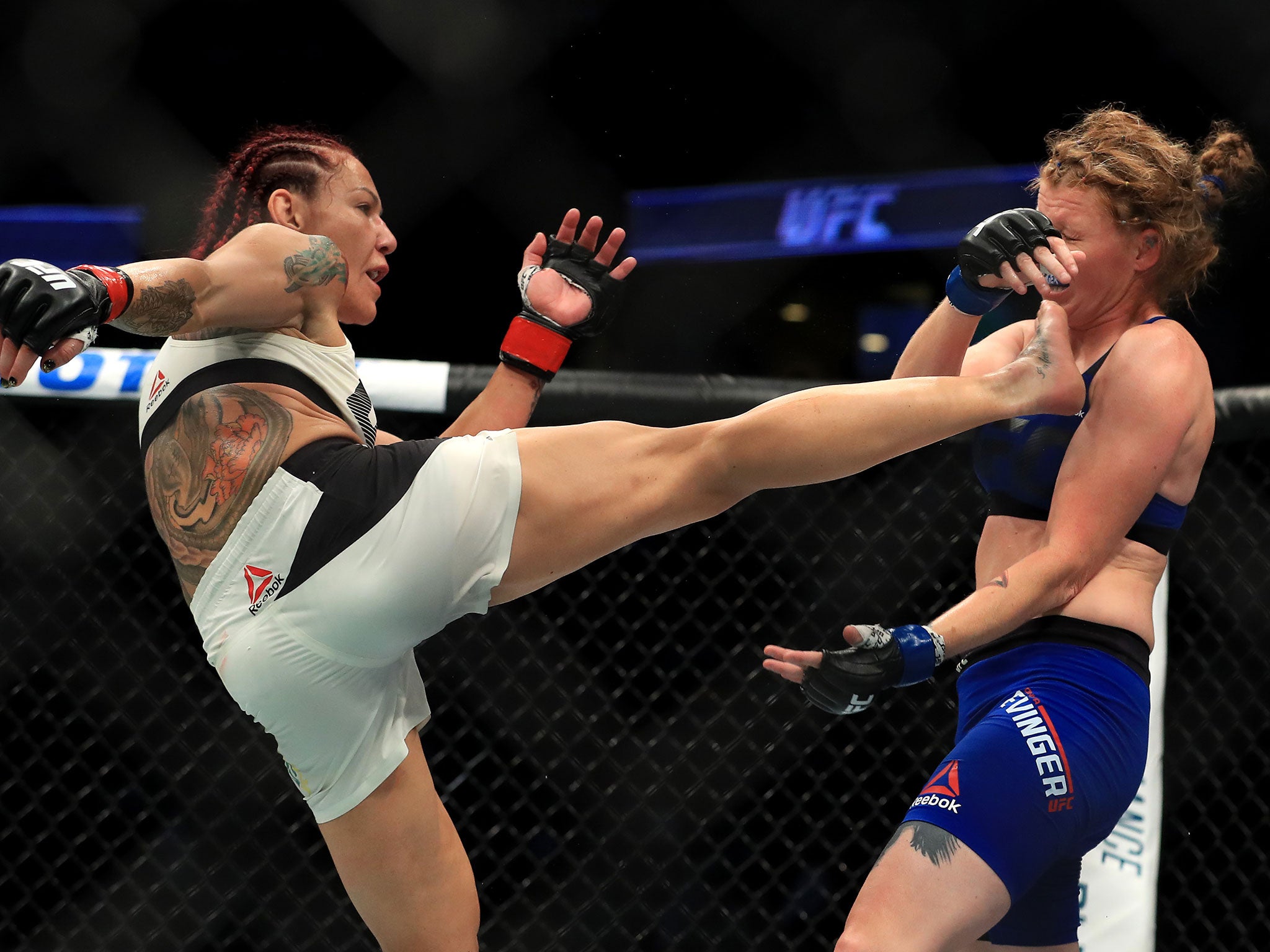 Crus Cyborg won the women's featherweight title by defeating Tonya Evinger