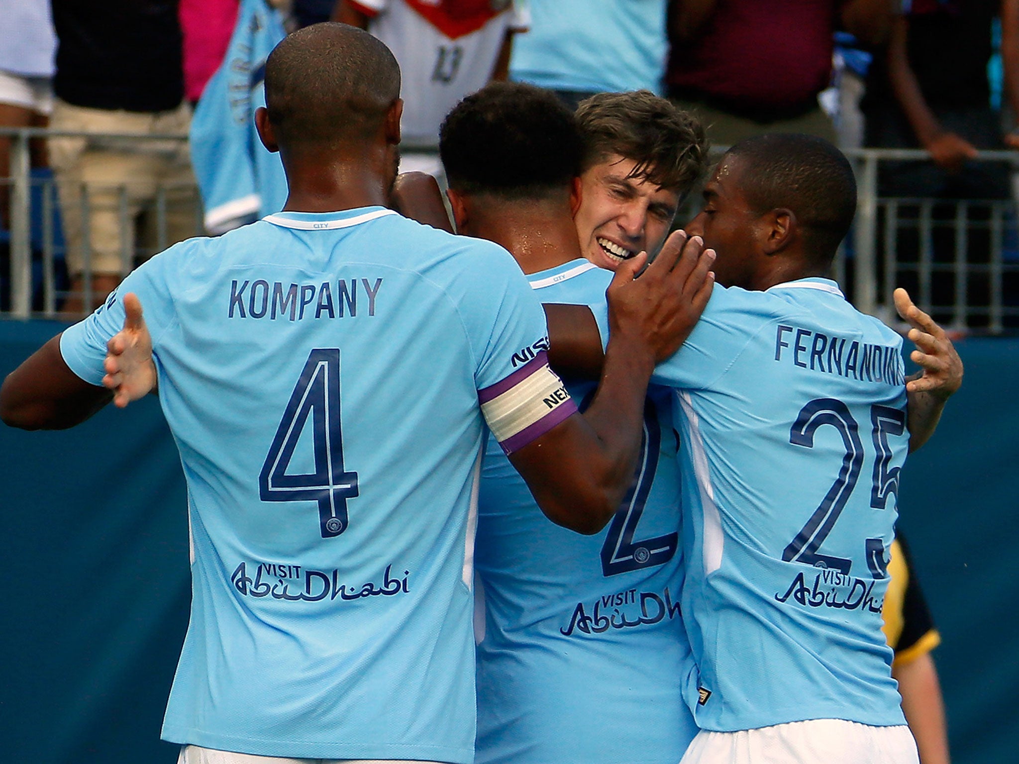 John Stones celebrates putting Manchester City ahead in their 3-0 win over Tottenham